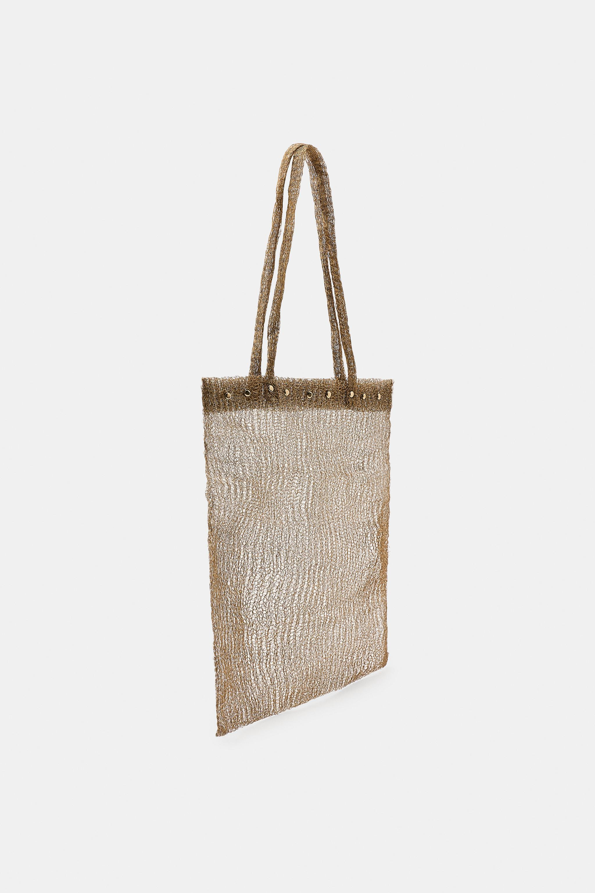 Rectangular semi-sheer metal mesh bag. Hand handles. Tonal stud appliqu\u00e9 detail.Height x Len... | Zara US