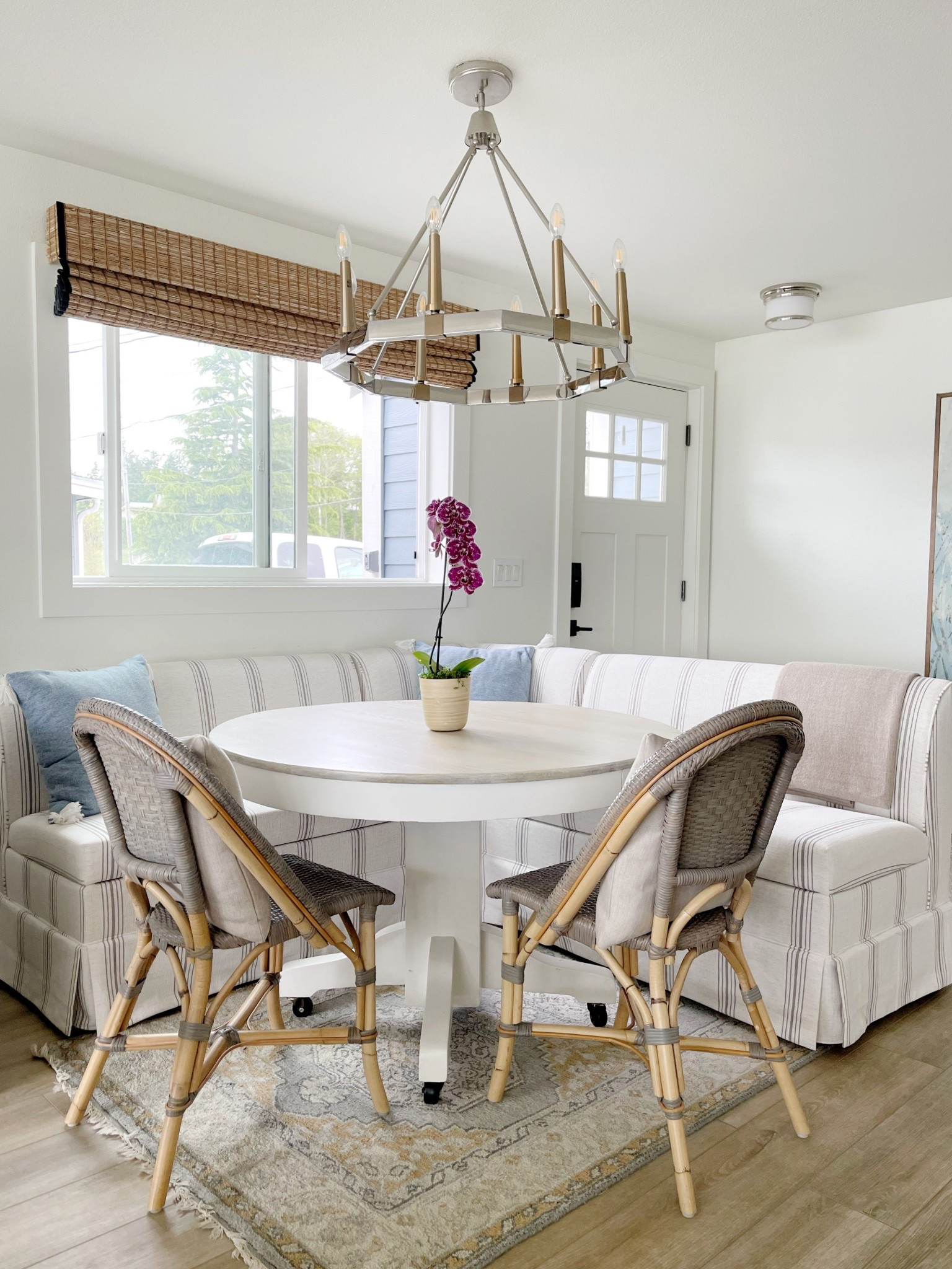 Coastal casual dining banquette with riviera chairs at @priestpointbeachhouse

#LTKSaleAlert #LTKHome