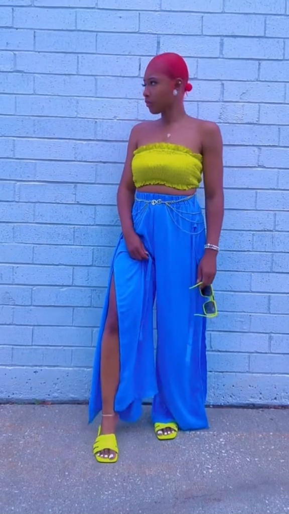 Bold color, effortless flow.
A strapless tube top styled with slit wide-leg pants and slide sandals for a statement summer look that moves beautifully.

#LTKootd