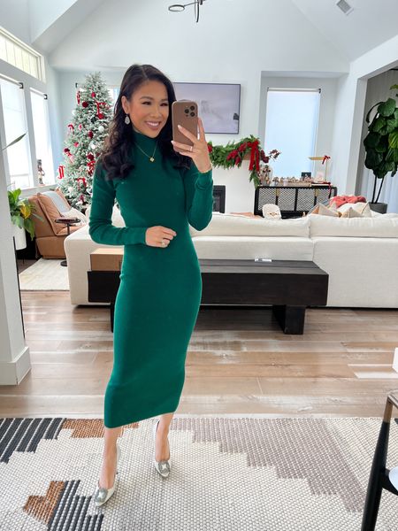 One of my favorite sweater dresses for this holiday season! I love the Everest green colorway and mockneck. Perfect for the holidays, holiday family photos, workwear and date nights! Super pretty and keeps you warm. Comes in black, also. Fits TTS and has some stretch! 

#LTKstyletip #LTKHoliday #LTKSeasonal