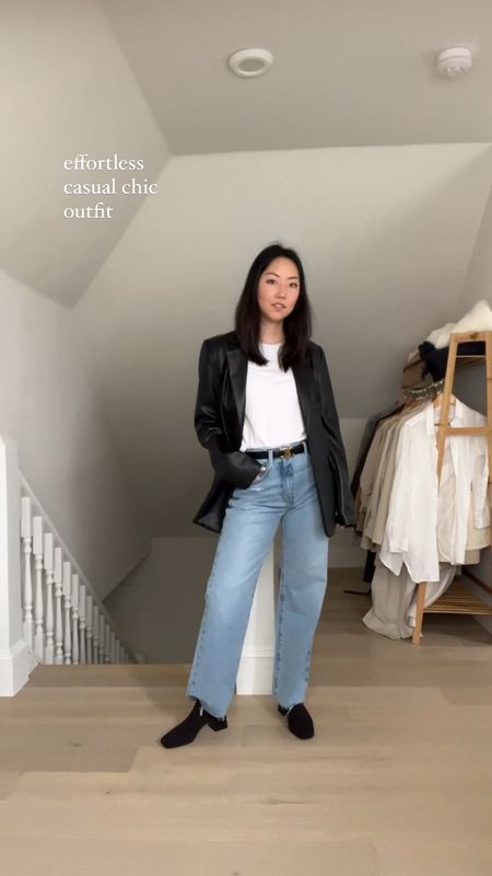 My go-to effortless outfit combo: high-waist denim, white tee, black jacket and boots 