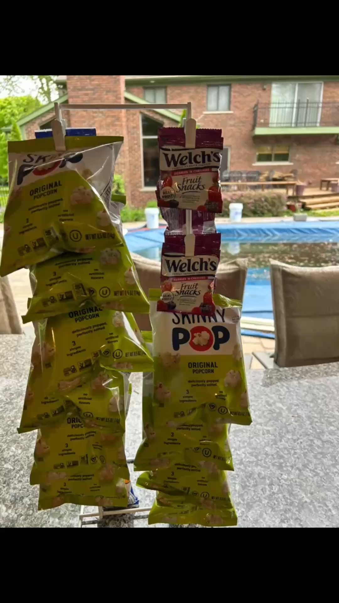 I love this concession style snack rack for all of the individual snacks to keep out by the pool and cabana during the summer months. It’s such a great way to display everything and everyone can easily grab them, even with wet hands. I’ll tag my exact one & a few similar.

#LTKFamily #LTKParties #LTKHome