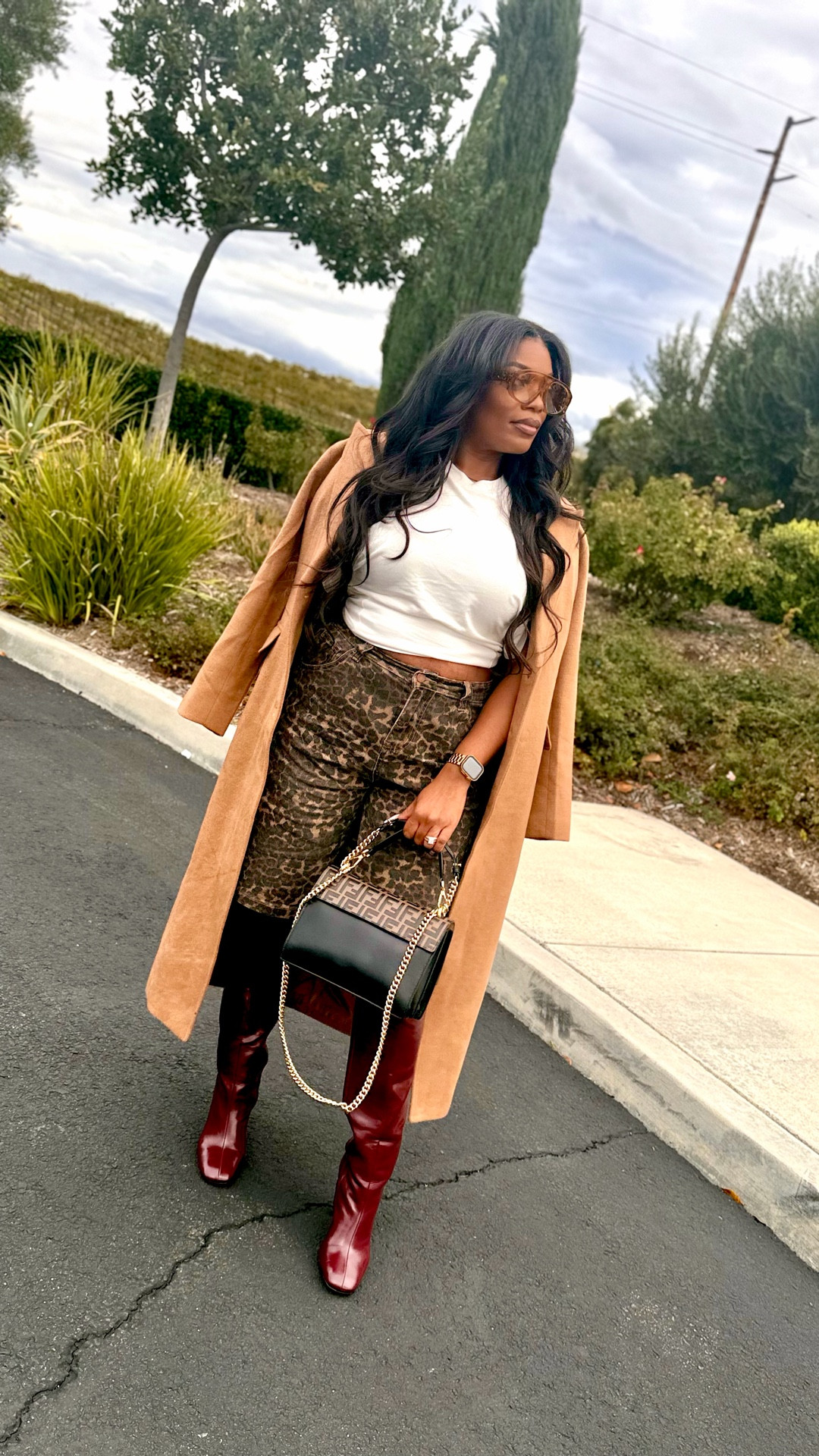 High–low styling is my love language 🤎
Leopard print + a crisp white tee, elevated with a camel coat, burgundy boots, and my favorite designer accessories. Proof you don’t need all luxury to look luxe.
Shop the full look + follow along for more elevated everyday style.

#LTKgrwm #LTKootd #LTKMidsize