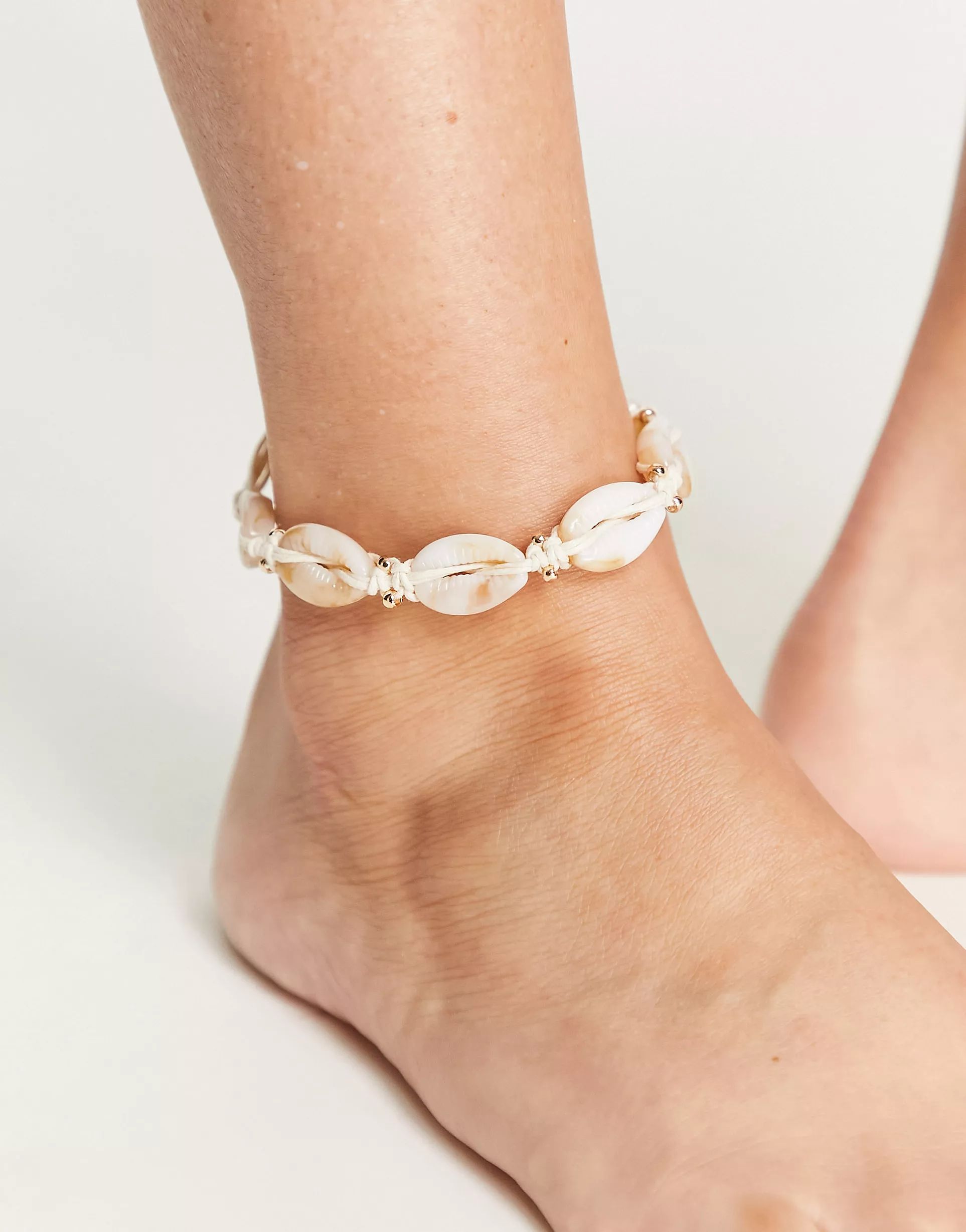 ASOS DESIGN anklet with faux shell and gold bead design | ASOS (Global)