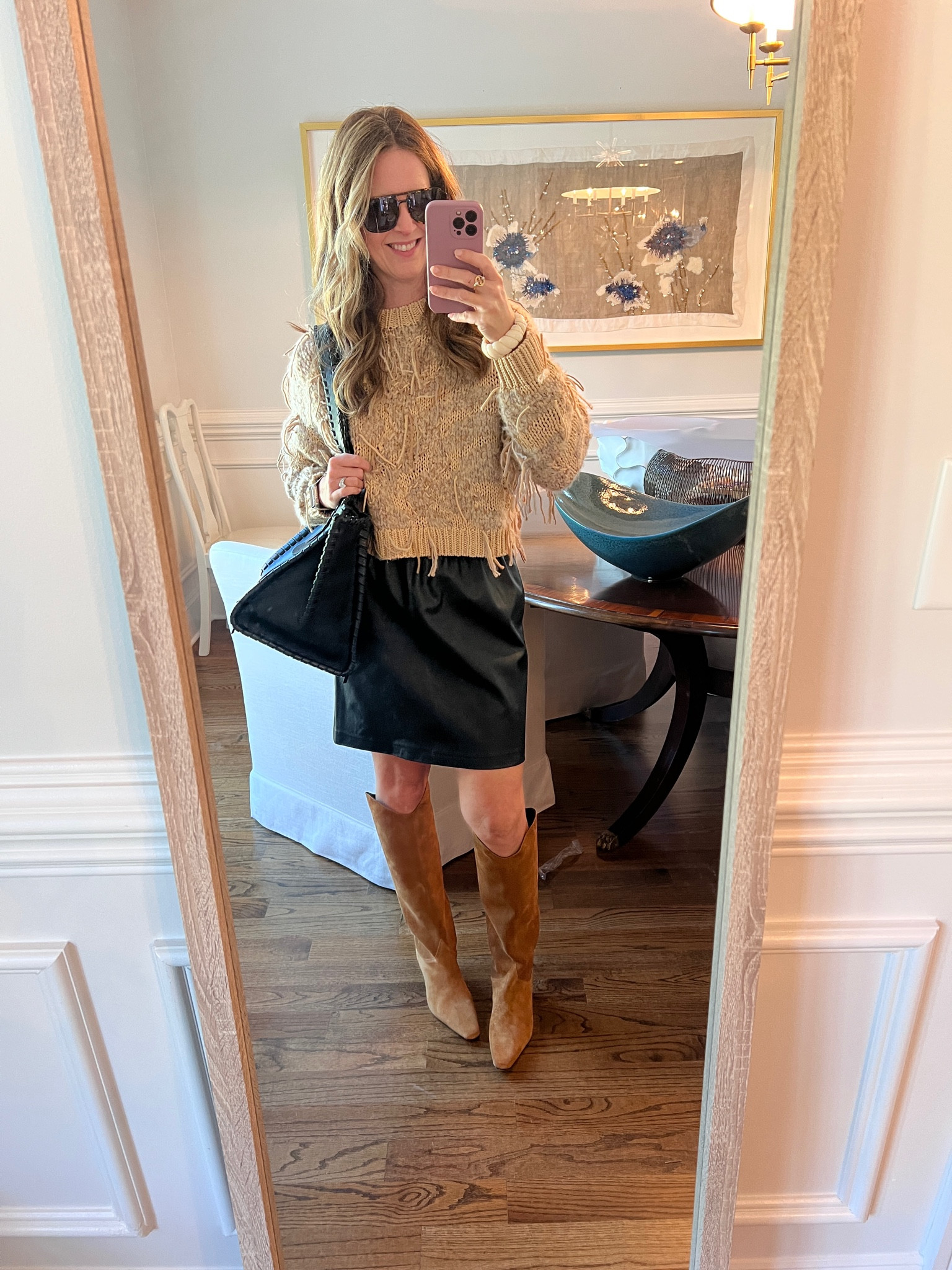 Cute leather skirt and fringe sweater. 

Fall outfit | family photos | boots | knee high boots

#LTKTravel #LTKOver40