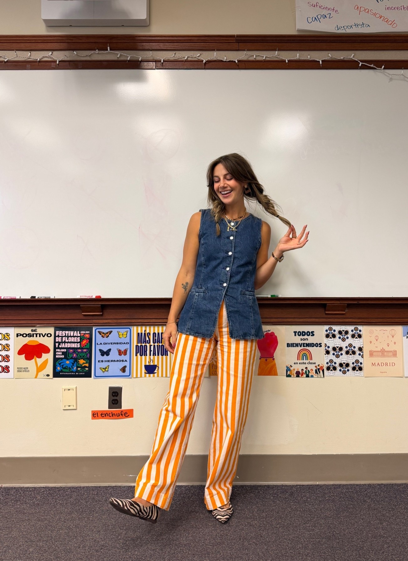 Teacher outfit of the day! Love this orange striped Colette pants paired with the denim cutaway vest. Size down in the vest!
Zebra pointed toe flats are true to size and so comfy!