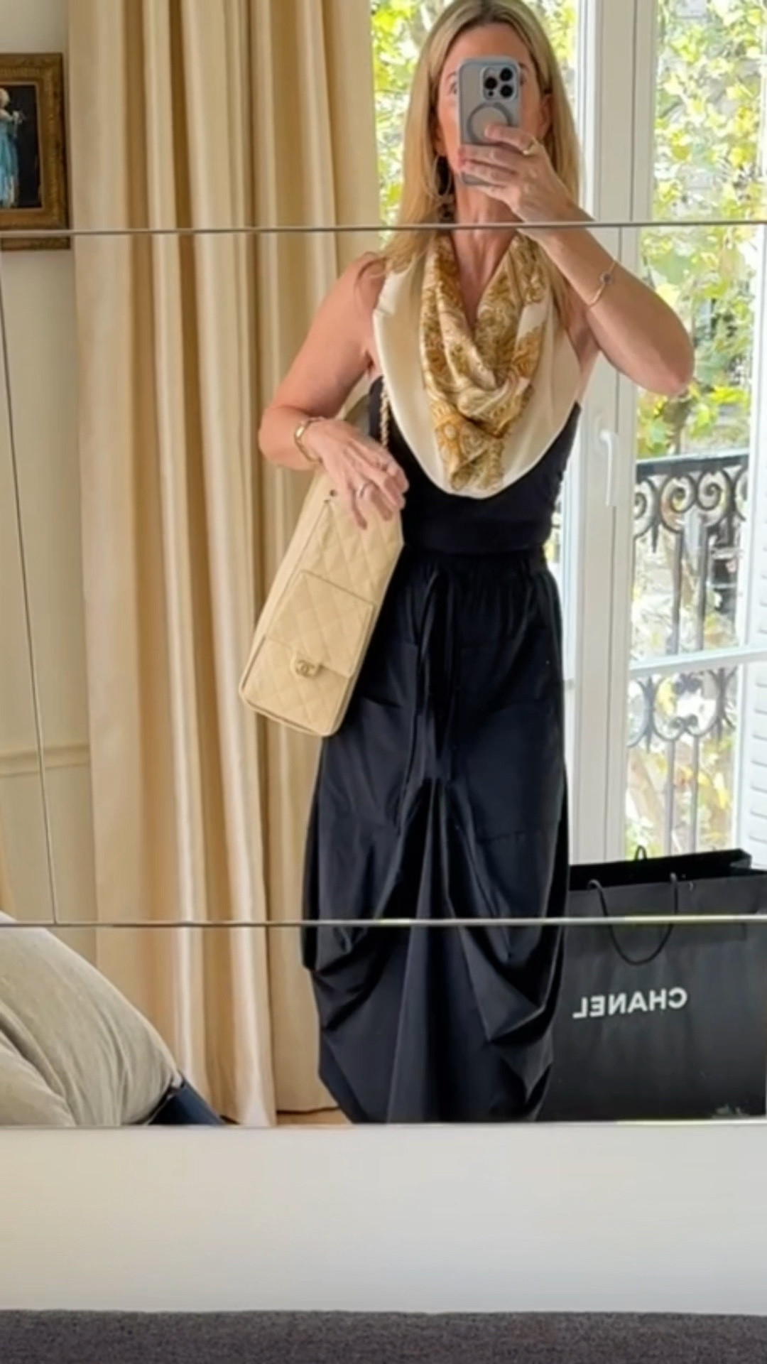 This skirt is special- the fabric the draping, the feel. It is worth it! I am wearing sz S. Wear with tall boots and tights in cooler weather months- it’s soooo good