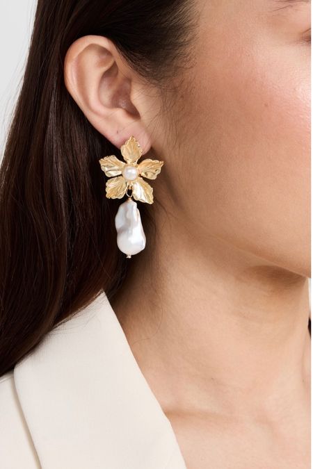 This is my favorite new jewelry brand! LOVE these statement earrings! Chic and fun!

#floralearrings #statementearrings #goldearrings #prettyearrings #statementjewelry #jewelry #accessories 

#LTKwedding #LTKstyletip