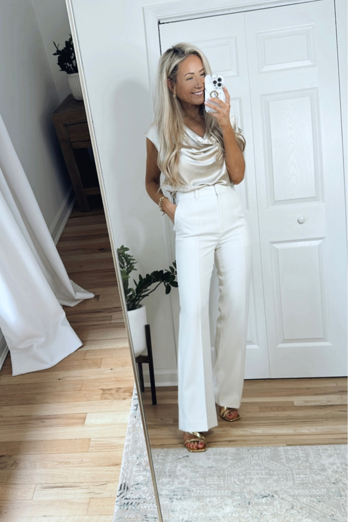 Holiday party outfit! 

Exact pants linked below, also linked a similar option for less!

Champagne satin top, winter white flare leg trousers, gold strappy sandals 

#LTKHoliday