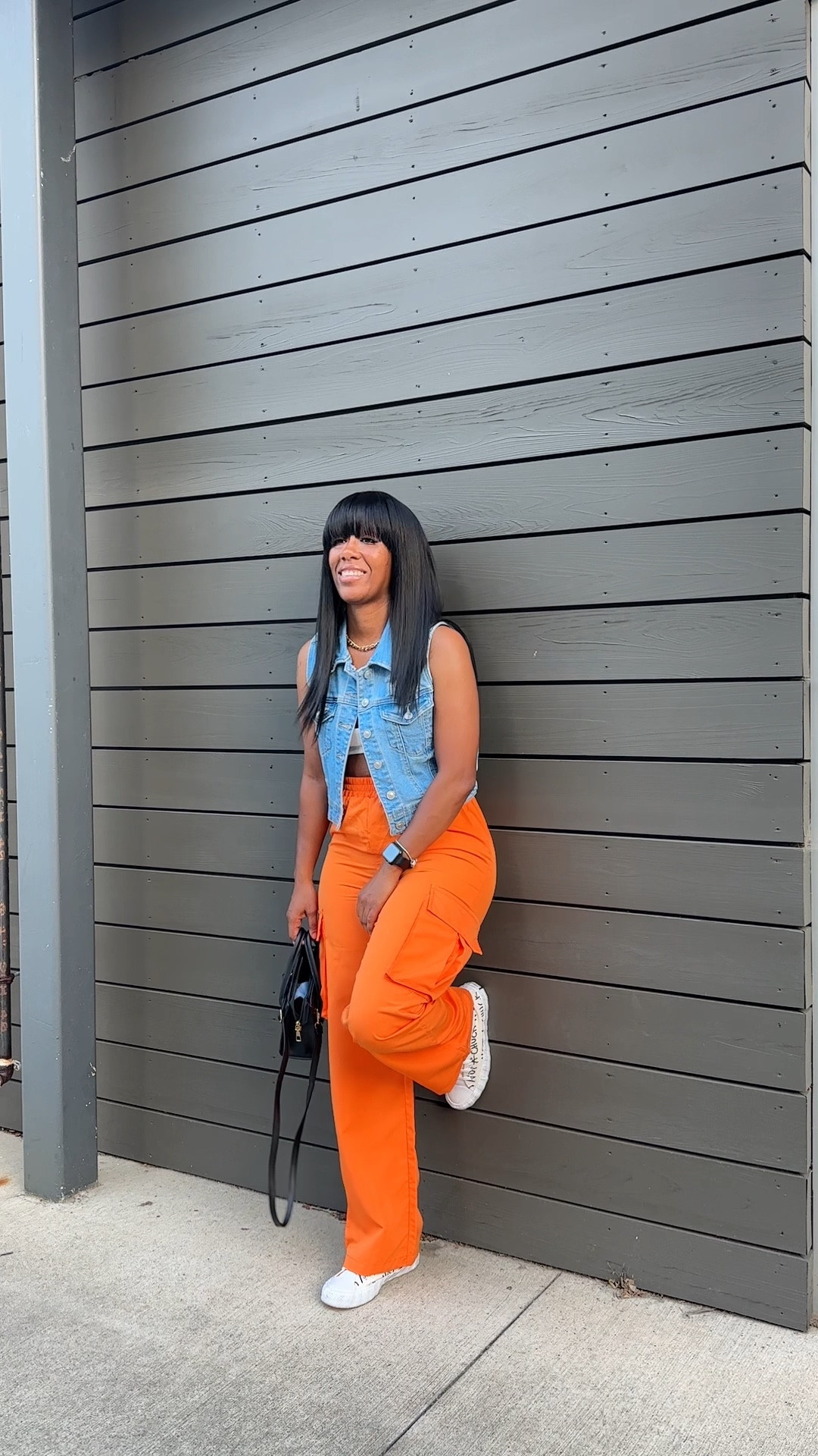 How to style orange cargo pants with a denim vest and white crop top

I styled this casual outfit with a black crossbody bag and converse sneakers

#LTKShoeCrush #LTKFindsUnder50 #LTKBacktoSchool