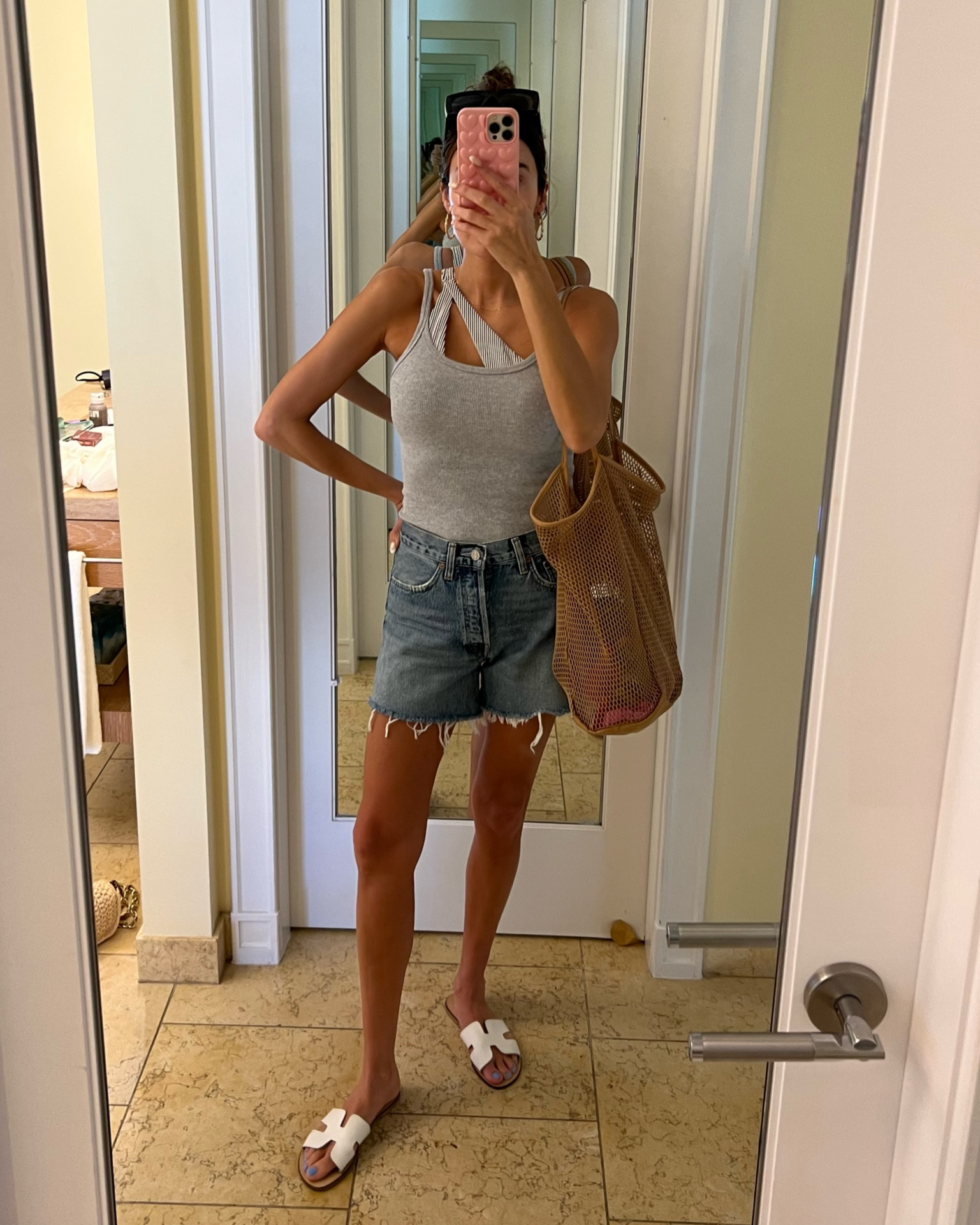 Casual beach day outfit 🌴☀️ these shorts are the perfect length to chase my kids in! 

Sizing:
Tank - small
Shorts - 25
Swimsuit - small 

Resort wear; beach look; beach style; pool style; beach vacation outfit; denim shorts; agolde parker shorts; mom style; mom shorts; mesh beach bag

#LTKswim #LTKtravel #LTKSeasonal