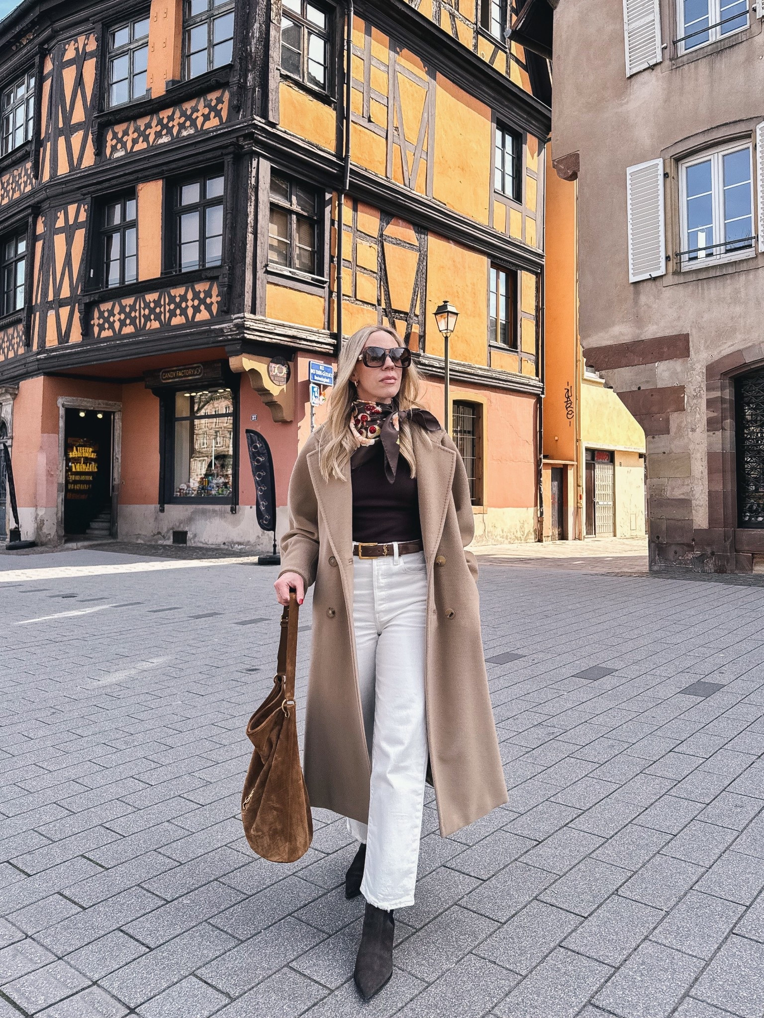 Spring outfit, silk scarf, Levi’s white ankle jeans, camel coat, suede bucket bag, white jeans with boots

#LTKOver40 #LTKSeasonal #LTKTravel