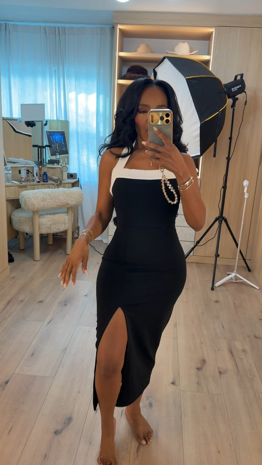 Classic with a twist — this color-block @Express dress gives you that hourglass shape with the most flattering slit detail. Chic, clean, and perfect for every holiday event on your calendar.

Perfect for: date nights, winter events, holiday dinners, cocktail hours

📏 Sizing: xtra Small dress  
Height — 5’4”  
138 lbs  
Bust — 34D  
Waist — 27”  
Hips — 40”

Favorite to revisit later.

Timeless black and white dress outfit ideas, sleek event-ready looks, chic winter outfits, elevated holiday style inspiration.

Follow me on Instagram and YouTube @kirasfashionfinds