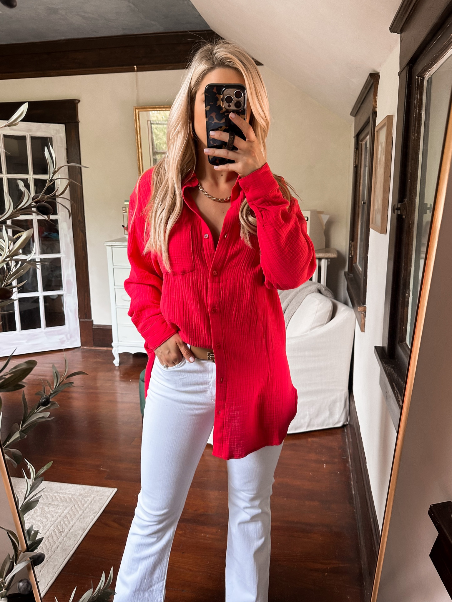 Red gauze shirt, size small
White flare jeans
