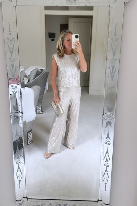 This sequin top and pant are so flattering and the ivory monochromatic color is so beautiful this time of year.   

holiday sequin outfit
christmas party outfit
sequin top and pant
monochromatic party outfit 

#LTKstyletip #LTKHoliday #LTKover40