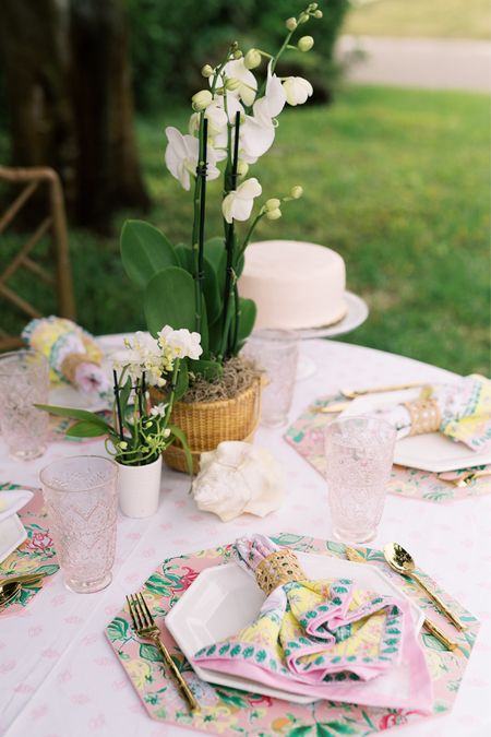 Lilly Pulitzer Tablescape and table top linens, plates and charger placemats. Tablecloths and napkins with a subtle block print mixed with classic Lilly Pulitzer prints. Rattan cane napkin rings. Melamine plates that are perfect for outdoor dining (and indoor too). 

#LTKGiftGuide #LTKParties #LTKSeasonal