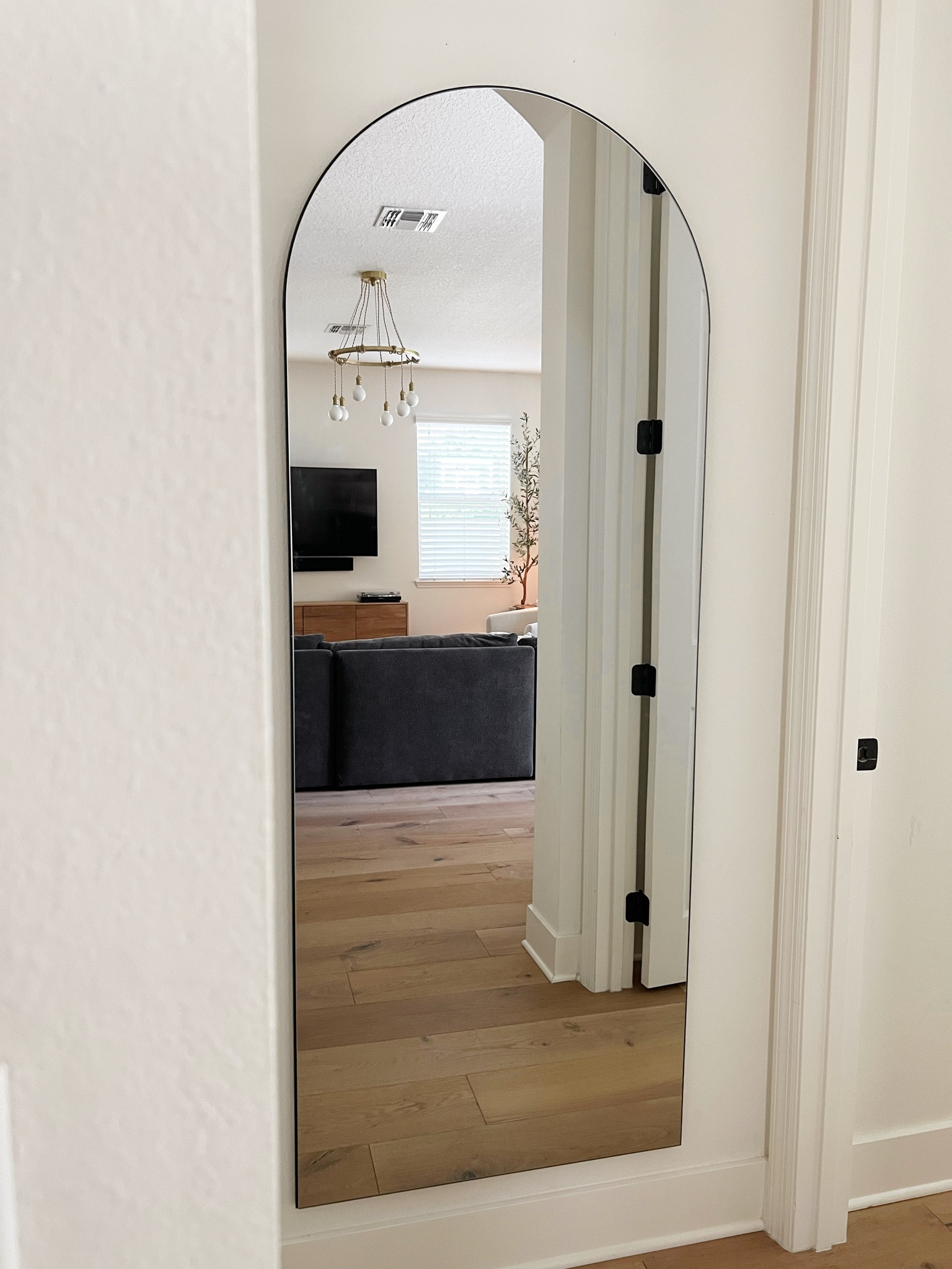 Arched mirror from Amazon! Loving how it brings more light into the space ✨ 

#LTKhome #LTKFind #LTKfamily