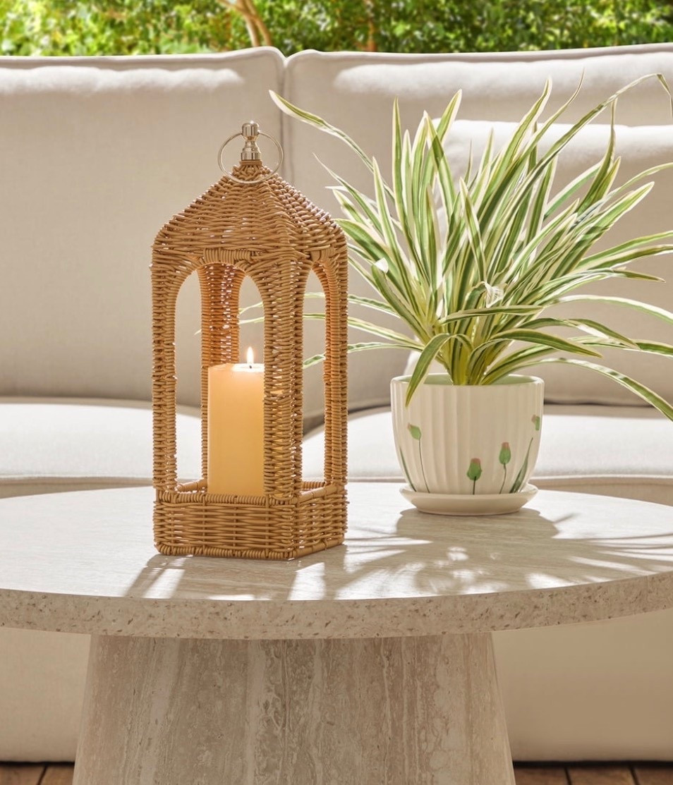 My Texas House Rattan Lantern adds a warm and inviting touch to your home with its natural woven texture and timeless cottage-inspired style. This 14.75-inch lantern is designed to bring soft ambience to any space, whether you place it on a tabletop, mantel, or entryway. The open rattan weave allows candlelight to glow gently through, creating a cozy atmosphere perfect for everyday decor or seasonal displays. Its lightweight construction makes it easy to move and style, while the sturdy shape offers a polished, decorative finish. Pair it with your favorite LED candle to complete the look. My Texas House Rattan Lantern brings relaxed, charming appeal to any room in your home @walmart