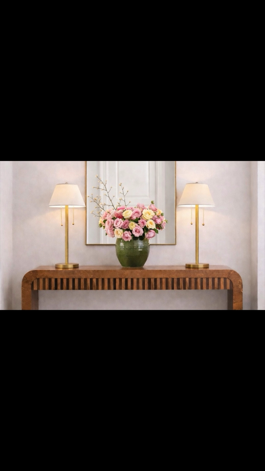 A refined entry moment — clean-lined console with drawers, flanked by brass table lamps, and layered with soft florals over a checkered rug.

Light, structured, and quietly elegant — the kind of space that sets the tone the moment you walk in. Linked here.

#Entryway #ConsoleTable #TableLamp #BrassDetails #CheckeredRug #FloralStyling #HomeRefresh #LTKHome

#LTKHome #LTKFestival #LTKSaleAlert