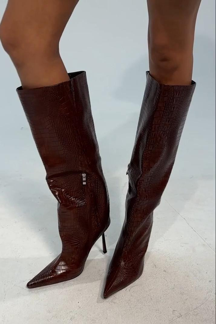 Tired of basic brown boots that disappear into your outfit? The AZALEA WANG Madeye Brown Croc Knee High Stiletto Boot combines a rich brown shade, croc-inspired texture, sleek knee-high silhouette, and stiletto heel for a bold statement. Perfect for fall outfits, birthdays, date nights, girls’ nights, brunch, or dinner, pair them with mini dresses, denim, leather, or neutral looks. 

 #LTKgrwm #LTKootd #LTKOver40