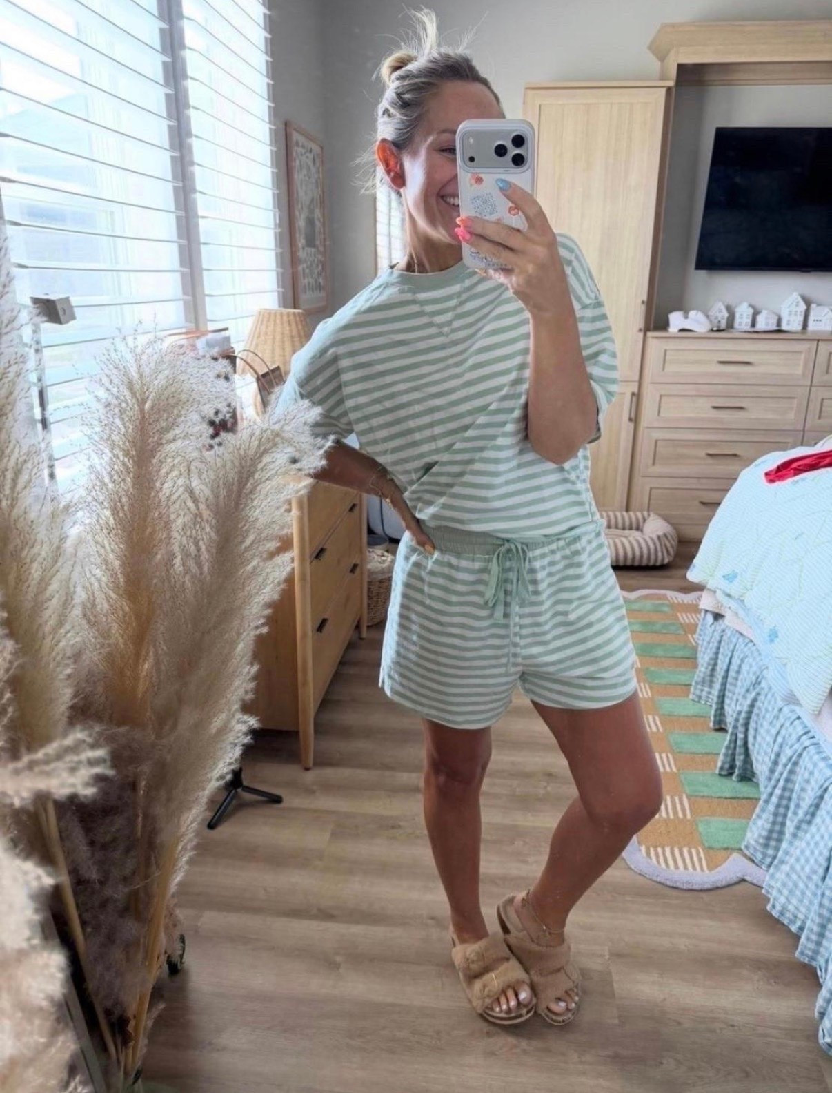 The set I’ll be living in all summer 🤍🍃 This striped matching set is lightweight, ridiculously soft, and one of those outfits that looks put together with almost zero effort. Perfect for slow mornings, running errands, vacation, or just staying comfy at home. Paired it with my favorite cozy slides for the easiest summer look.

Comment LINK and I’ll send you all the details! ✨