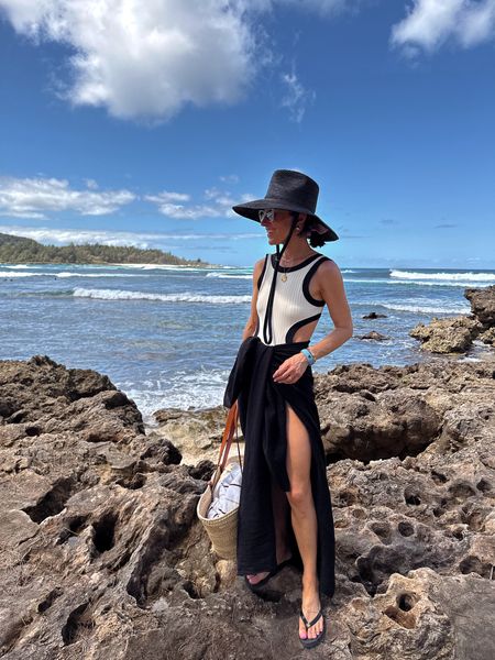 Today’s beach look 
Love this suit- so comfortable and chic- runs tts and good booty coverage 
Black sarong is a favorite from last year 

#LTKover40 #LTKswim