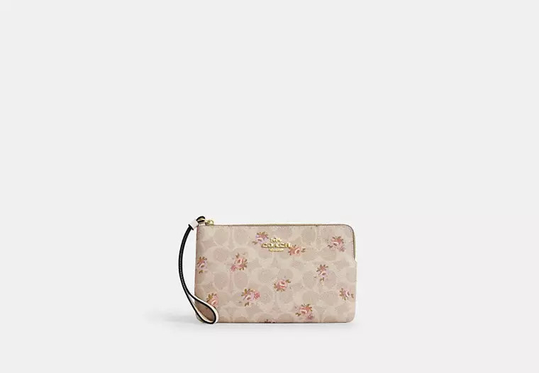 Large Corner Zip Wristlet In Signature Canvas | Coach Outlet US