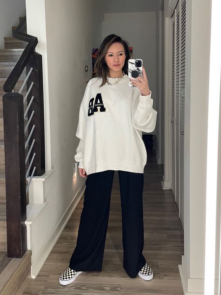 Casual spring outfit 🤍 What I wore running errands.  Love this new Anine Bing sweatshirt—it’s so soft! Styled with trousers and my favorite Vans sneakers that look great with everything. My chunky silver necklace is 20% off, run! 

Sweatshirt, trousers, white and black sneakers, neutral sneakers, Vans sneakers, Anine Bing, silver necklace, sale, The Stylizt 

#LTKStyleTip #LTKShoeCrush #LTKFindsUnder100