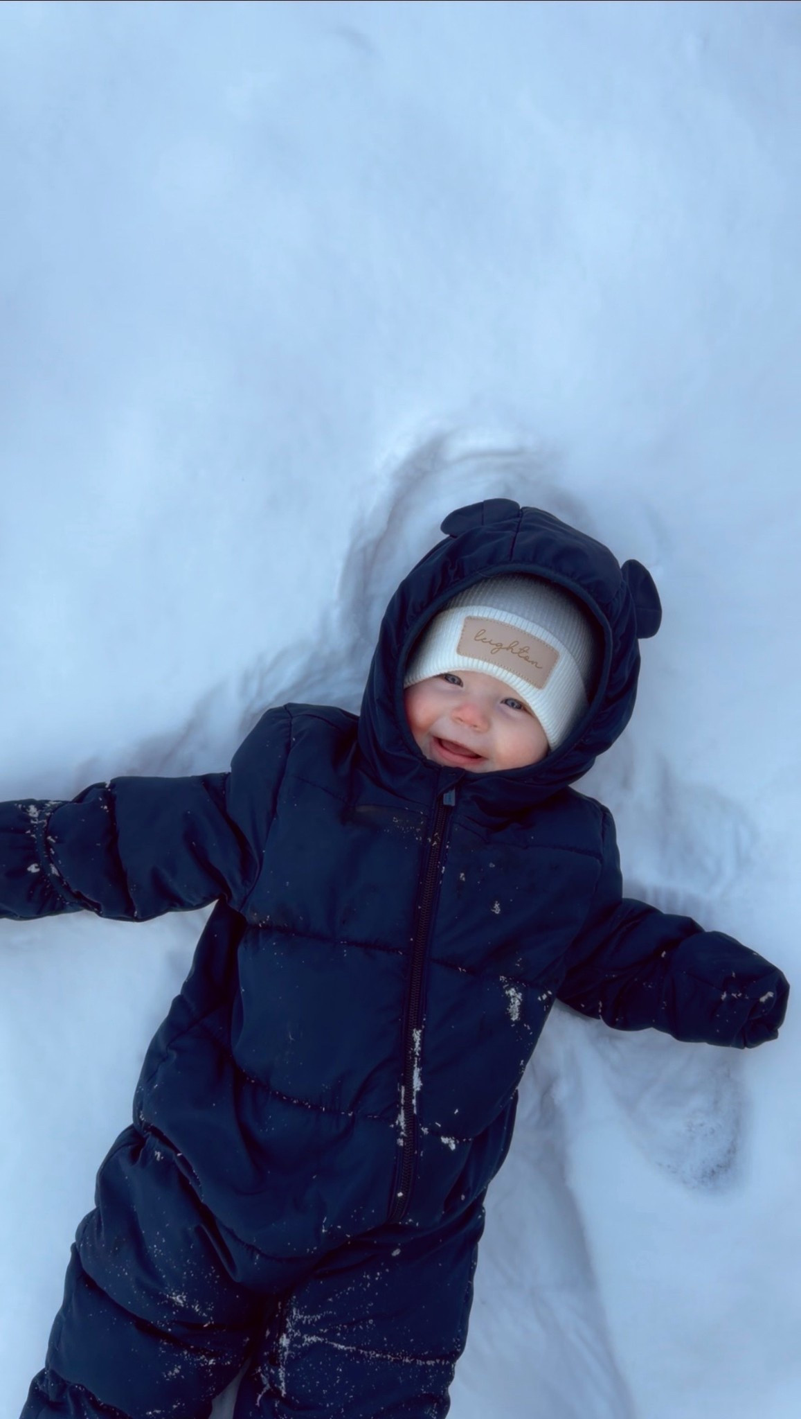baby’s first snow day 🥹❄️ loving her personalized @Caden Lane beanie!!! 

#LTKBaby #LTKKids #LTKBump