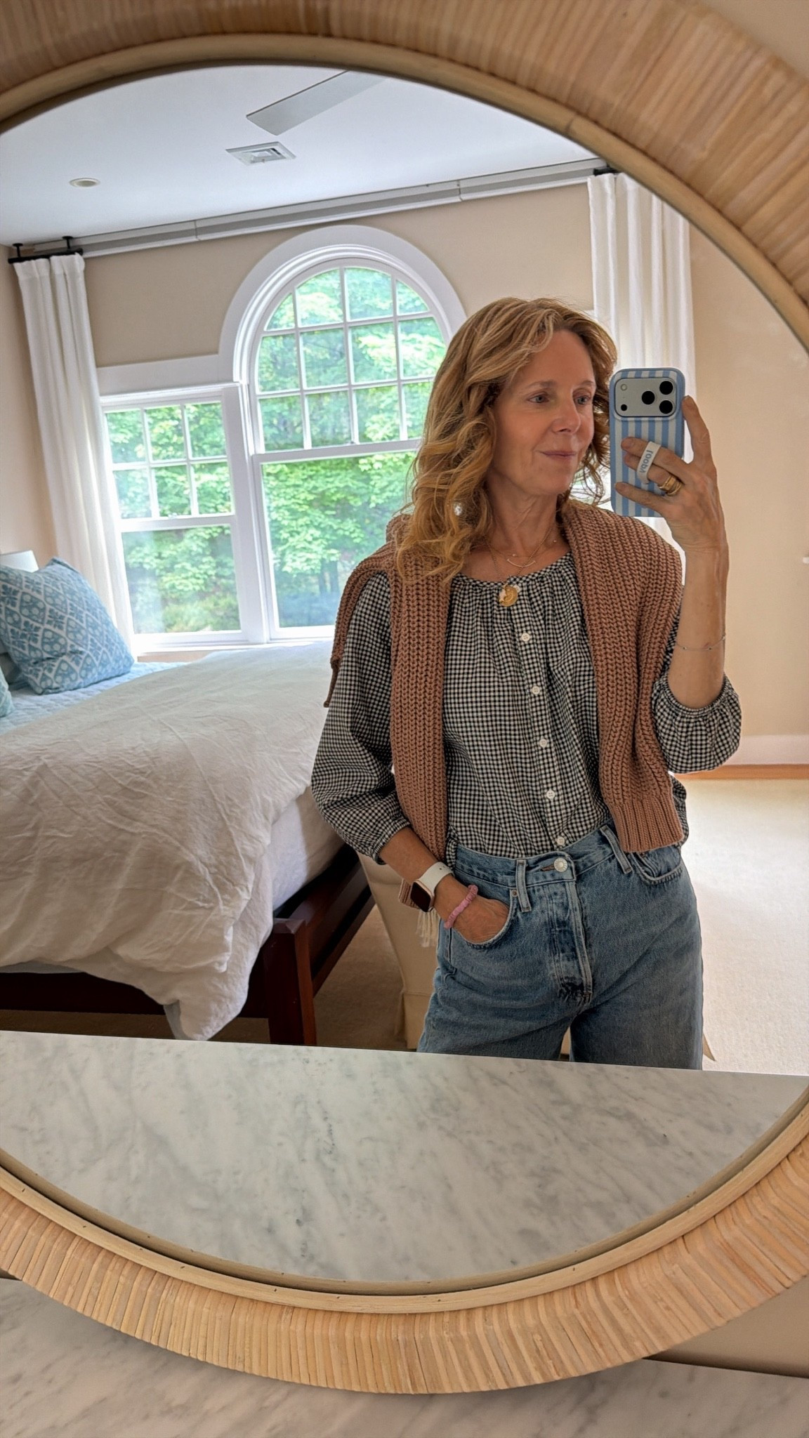 Easy breezy gingham top with camel sweater loose over the shoulders

#LTKootd #LTKdayinmylife #LTKgrwm