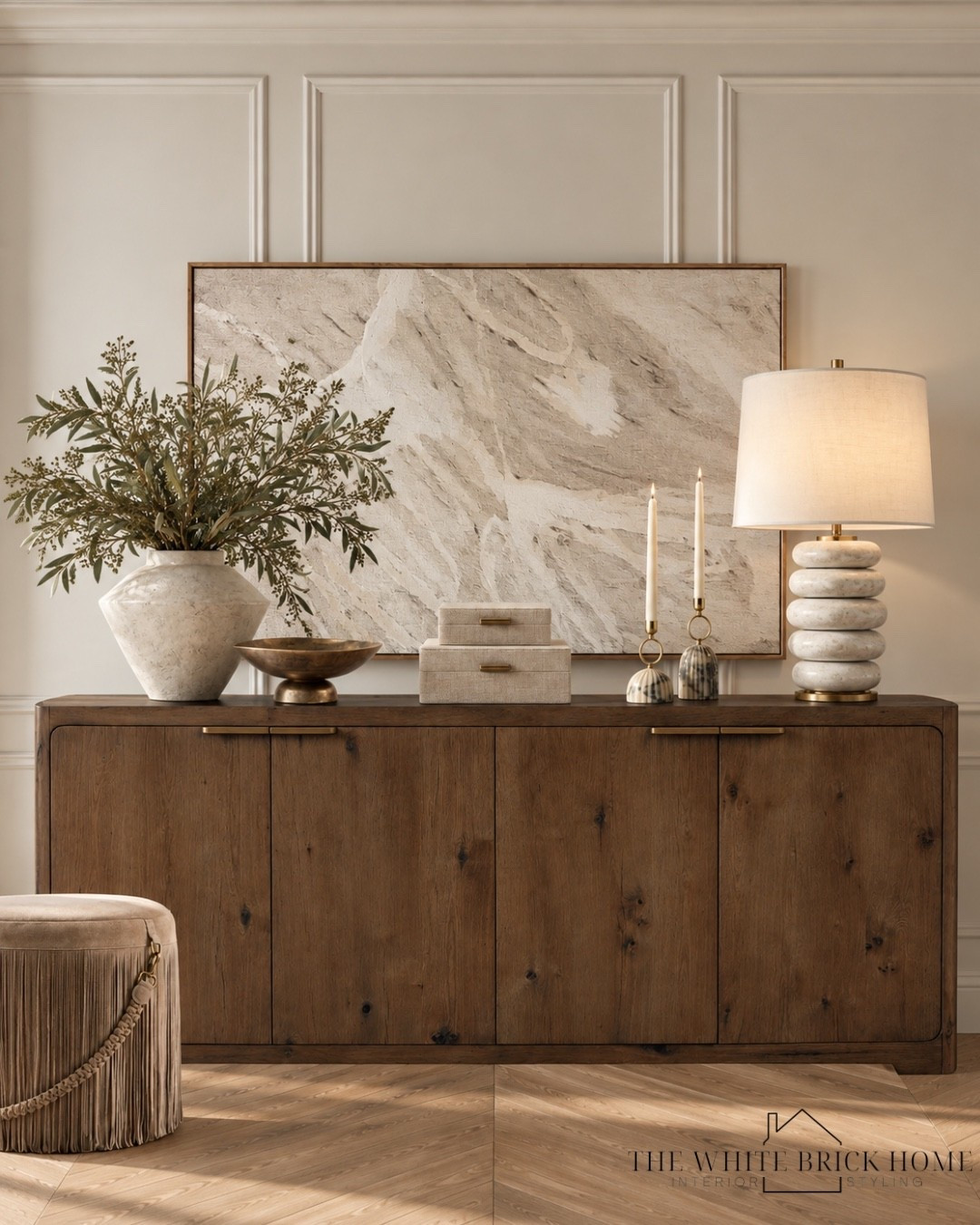 Timeless elegance meets warm, layered textures in this beautifully styled space, where every detail feels effortlessly sophisticated. 

Dining room, dining room console, console table, buffet, dining room buffet table, buffet table, storage table, storage cabinet, home decor, home design, wall art, table lamp, wall art, wall art ideas, home decor, home design, lamp, home decor, home accents, home accessories, vase, faux greenery, dining room furniture, living room furniture, arhaus, McGee and co, pottery barn, cb2