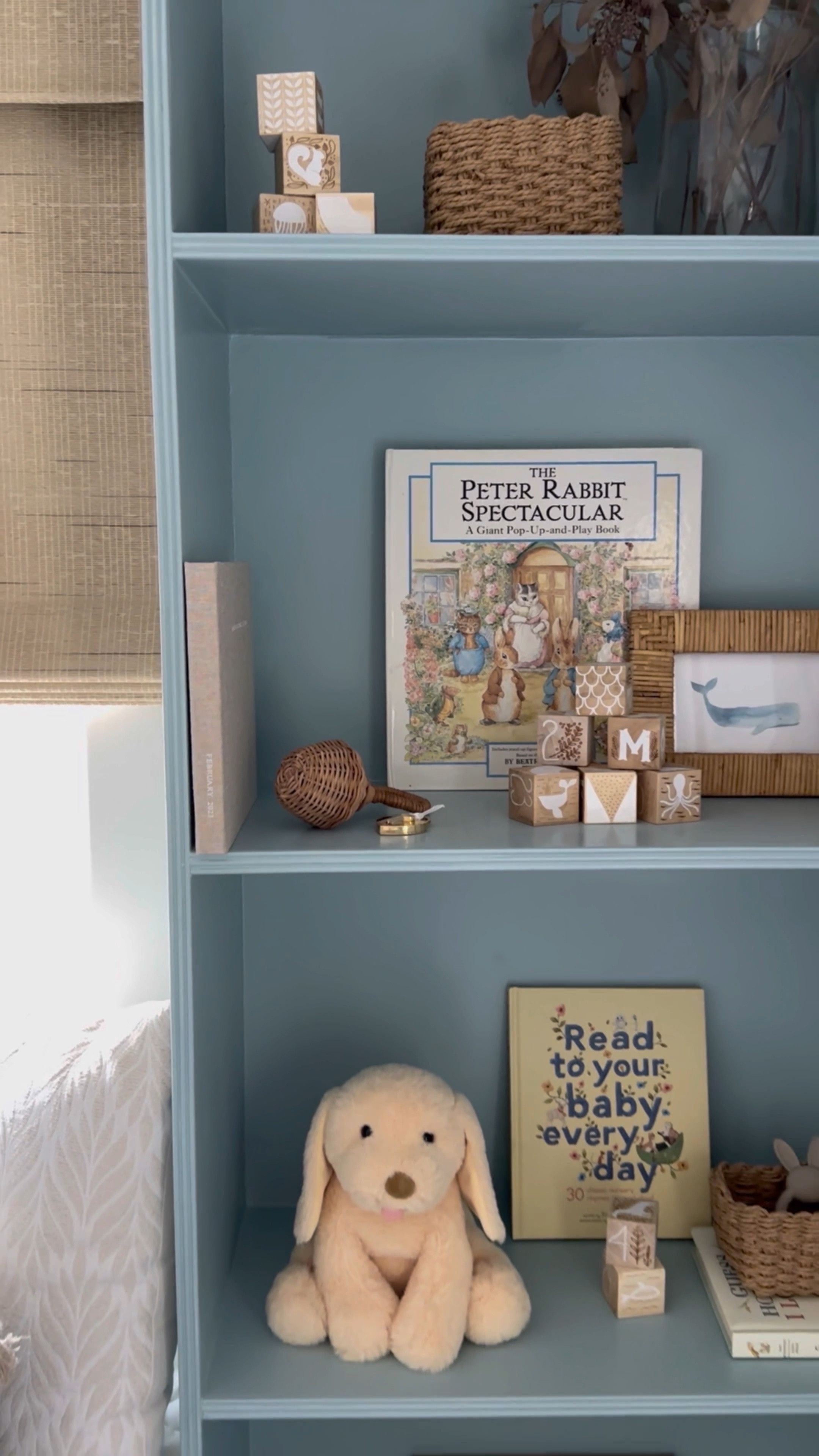 Motherhood moments come in many memory-making forms - the beautiful, the fun and the chaos. All of it should be documented and put into memories to reflect back on, and @artifactuprising is my go-to to do so! From frames, to books and prints, honor Mom's story with simple, elegant pieces that are easy to create. You can use code MEGLEONARD15 for 15% off your order via the link in bio! Pictured here: Layflat album, square print set and the brass & wood display box. #AUPartner
•
•
•

baby nursery, blue wallpaper, white crib, glider, neutral loloi rug, soft rug, Roman shades, nursery design, nursery decor, woven hamper, crib skirt, gender neutral nursery, calm nursery, pouf, brass mirror, nursery shelf decor, changing table, woven changing basket, rabbit mobile, baby mobile, hutch
#nursery #nurserydecor #nurseryinspo #nurserydesign #nurseryinspiration #babyroomdecor #babyroom #neutralnursery #genderneutralnursery #homedecor #wallpaperwednesday #homedesign #potterybarn #glider #crib #maternityshoot #maternityphotography #ltkhump #ltkbaby 
#pregnancyannouncement 
#liketkit  Shelf decor 