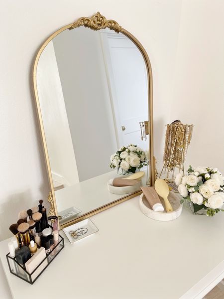 H O M E \ vanity setup with a pretty gold mirror from Amazon ✨

Beauty
Bathroom
Makeup 
Desk 

#LTKbeauty #LTKhome