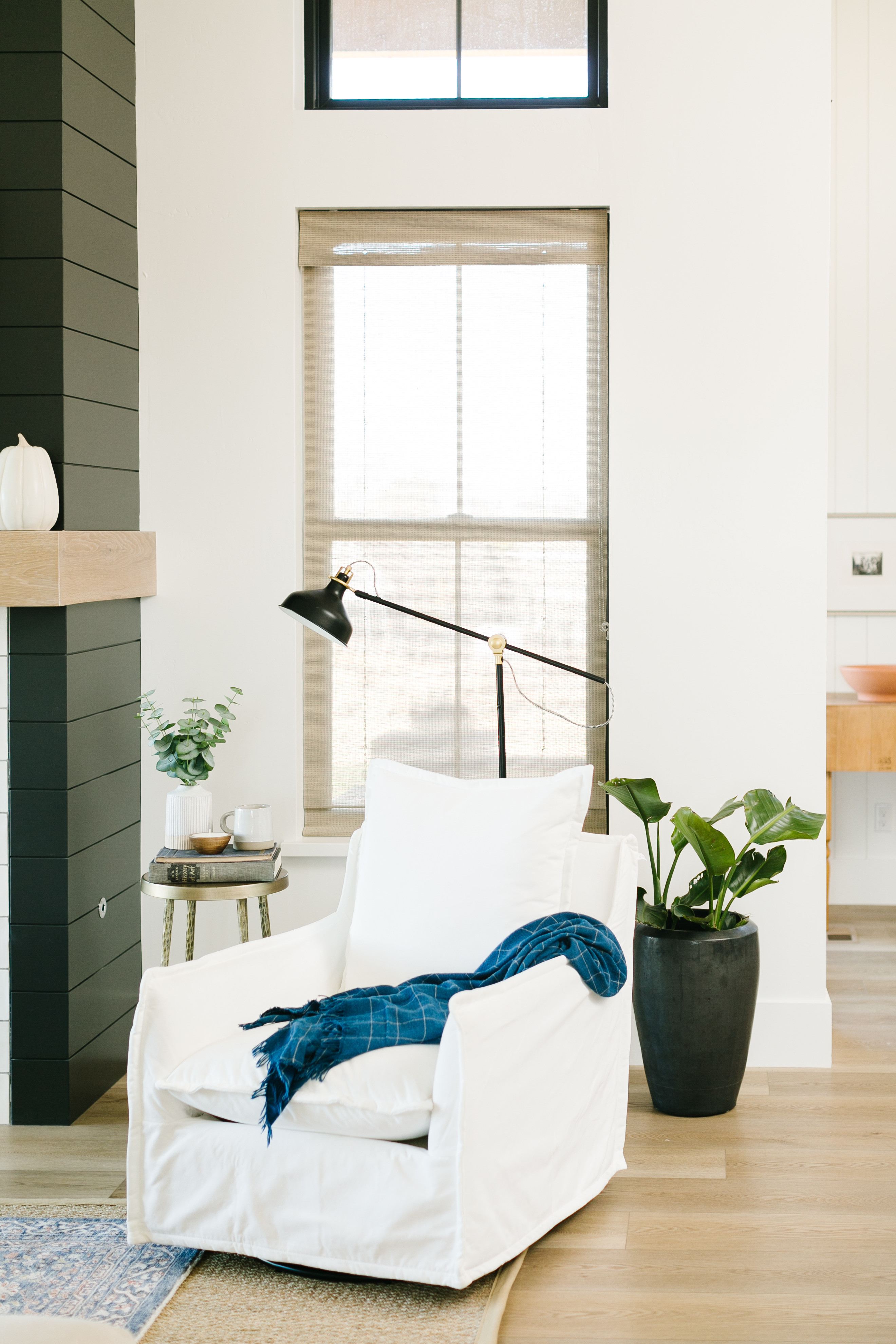 White chairs are good in theory, not always so great in reality.  However, I was pleasantly surprised with this swivel glider option.  It's a good price point for such a substantial chair but the best part is that the slipcover is removable so I can soak it in stain solution and get it back to white every so often.

This exact model isn't avaiblable anymore but there's a very similar option that has good reviews and is on sale right now! 

STYLING TIP: Use a barstool as a side table to repurpose them in a unique way! 

 

 #LTKHome