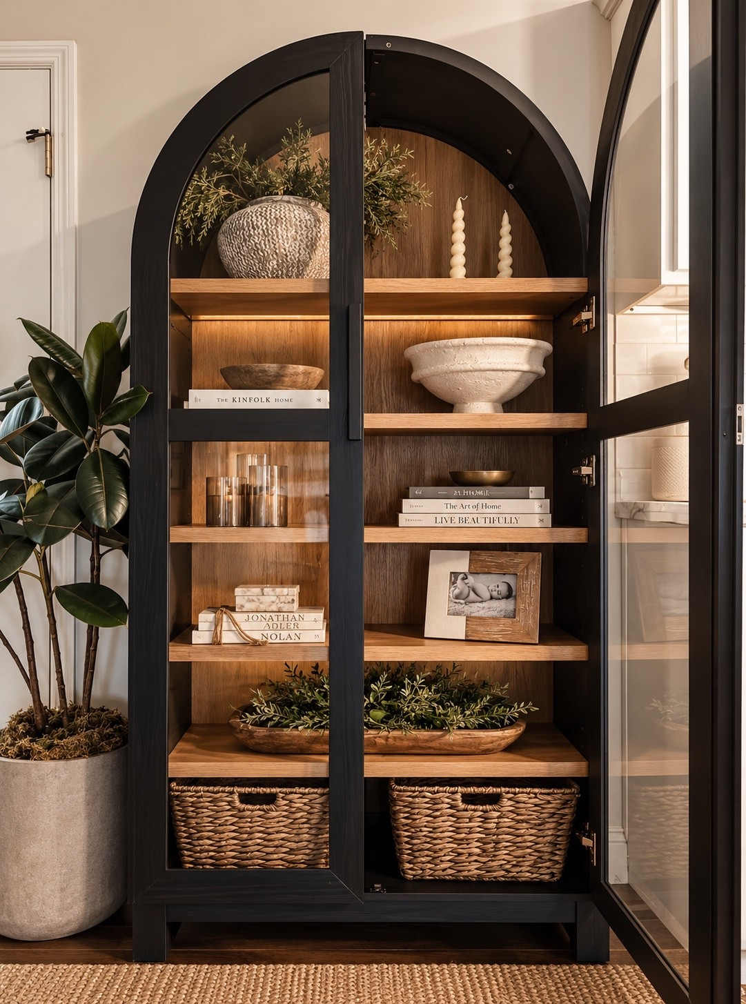 Walmart home find that looks way more expensive than it is 🤎 This arched cabinet is one of my favorite pieces in our home! I love the black finish, glass doors and warm wood shelves—and there’s so much room for styling + hidden storage. Such a good find for that modern organic look. ✨

#WalmartHome #WalmartFinds #ModernOrganicHome #LTKHome #HomeDecor

#LTKSaleAlert #LTKSeasonal #LTKHome