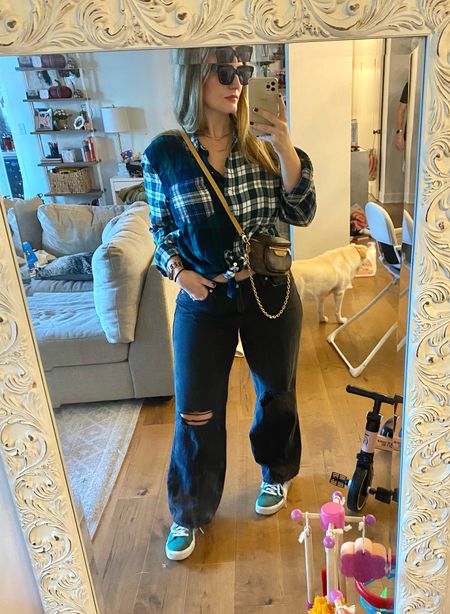 Embracing the baggy jean trend with the most COMFORTABLE black jeans from the gap. On sale too! Paired with my green van sneakers, green plaid shirt also from the gap and my LV mini bum bag. 

Apple Watch, watch band, plaid shirt, wide leg jeans, gap jeans, ripped jeans, black denim 

#LTKsalealert #LTKfindsunder50 #LTKmidsize