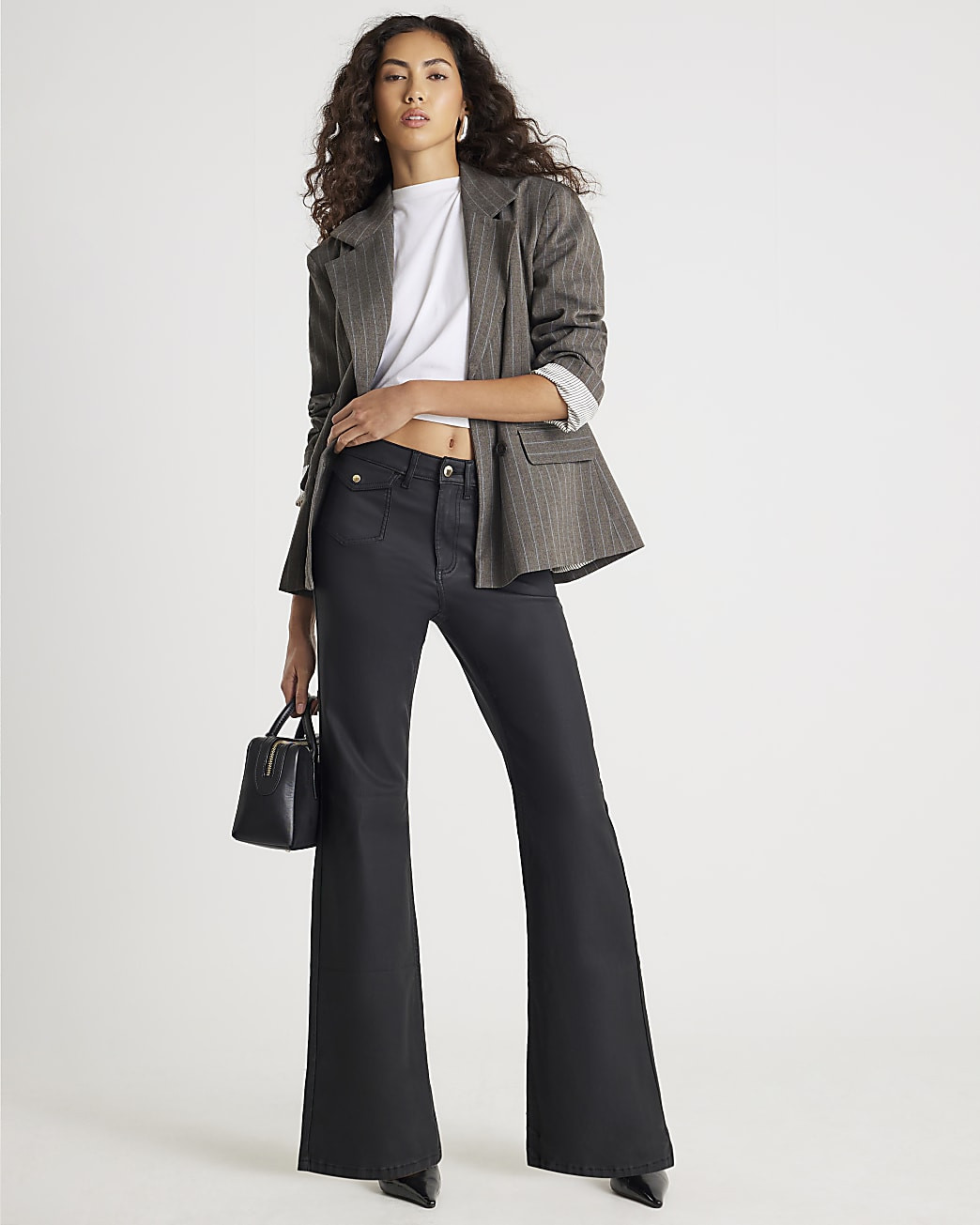 Black Coated Pocket Relaxed Flare Jeans | River Island UK & IE