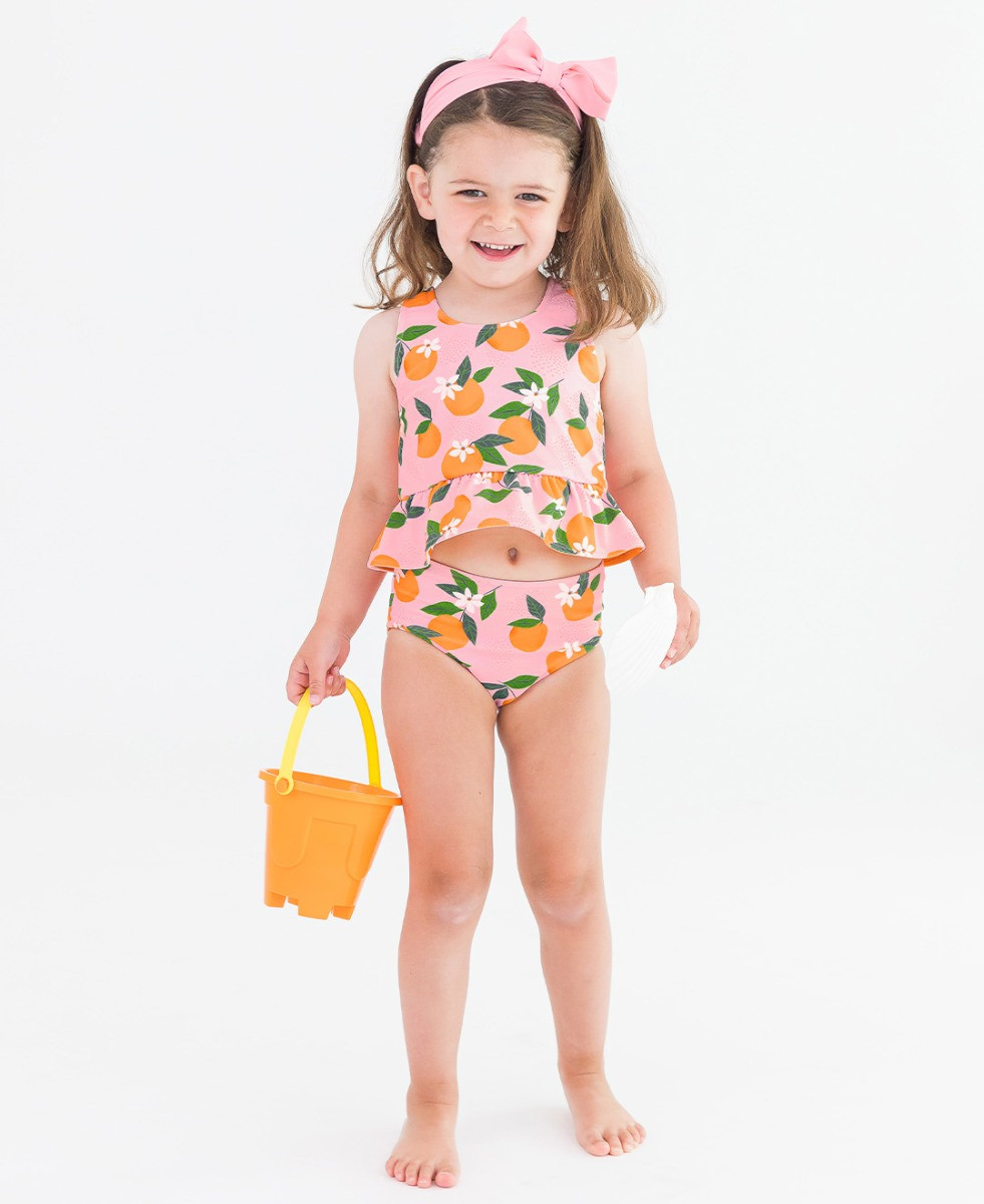 Reversible Peplum Tankini Swimsuit | RuffleButts / RuggedButts