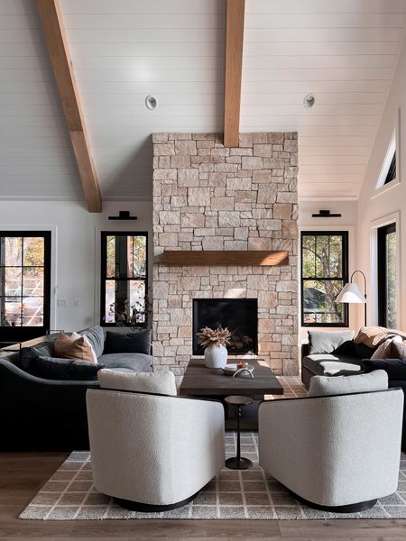Lake house great room! I knew from the beginning I wanted 2 couches flanking the fireplace with chairs. I love how cozy this room is! 

#LTKhome #LTKstyletip