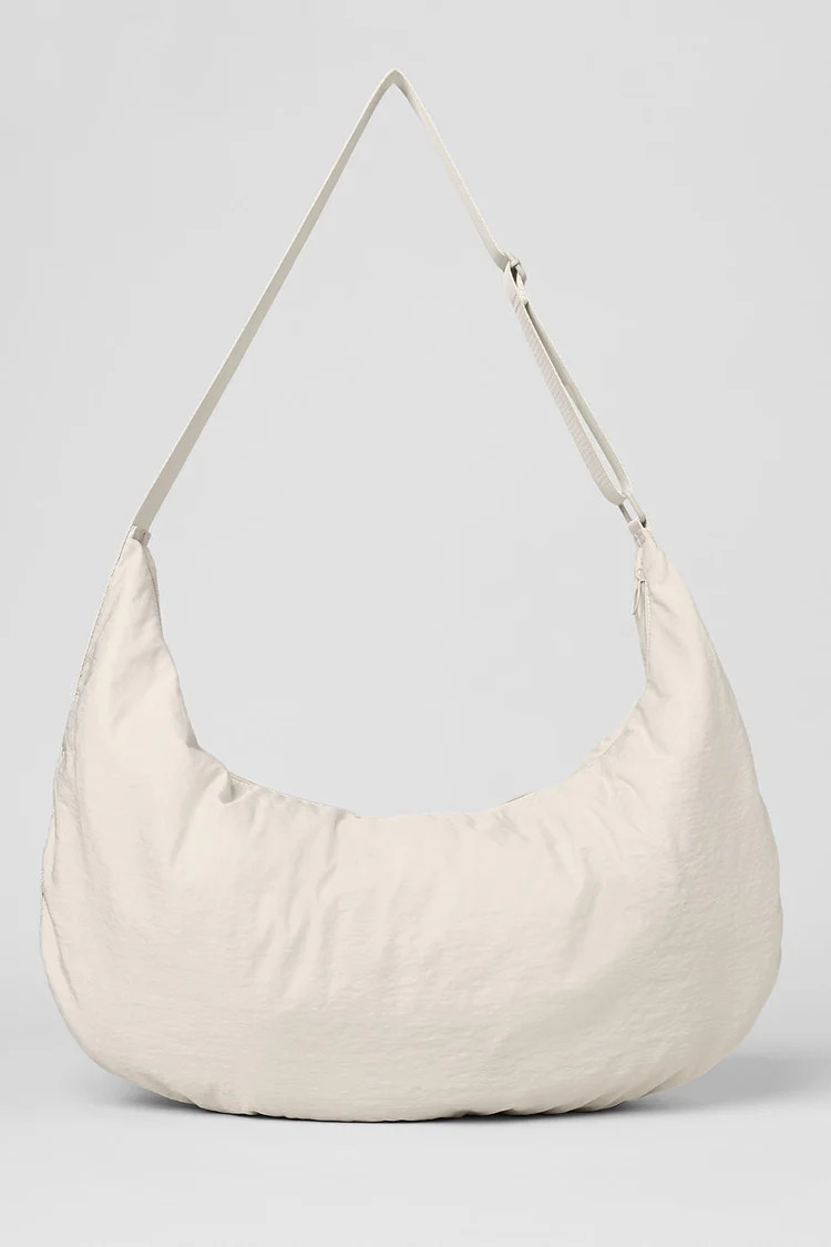 Om The Go Gym Sling Bag - Bone | Alo Yoga (US)