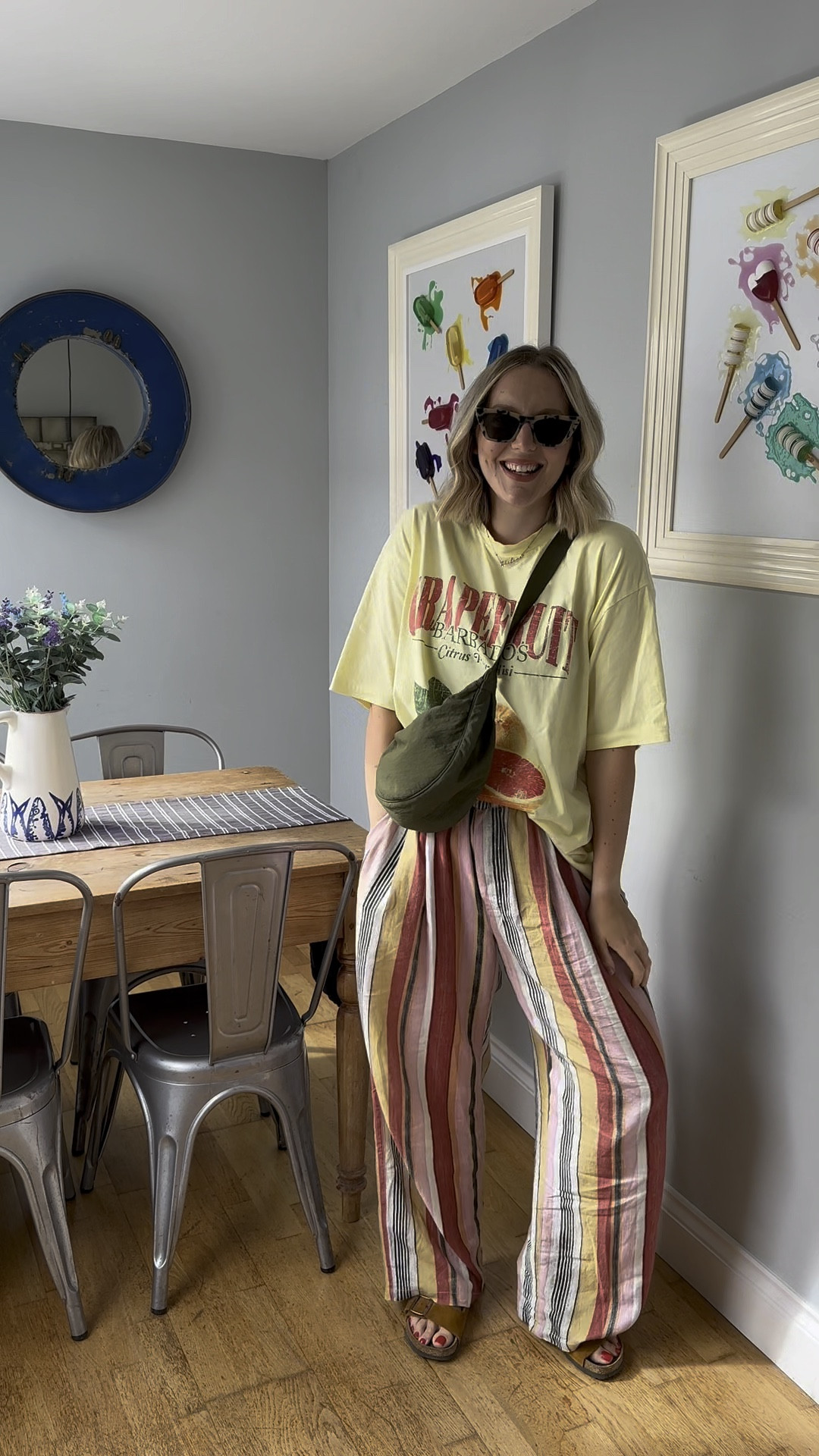 Colourful Holiday Outfit, with the most beautiful trousers 😍.
Birkenstock sandals, Topshop striped trousers (size m), asos graphic tee (size s), Uniqlo bag, & other stories sunglasses.

#LTKuk #LTKeurope #LTKsummer