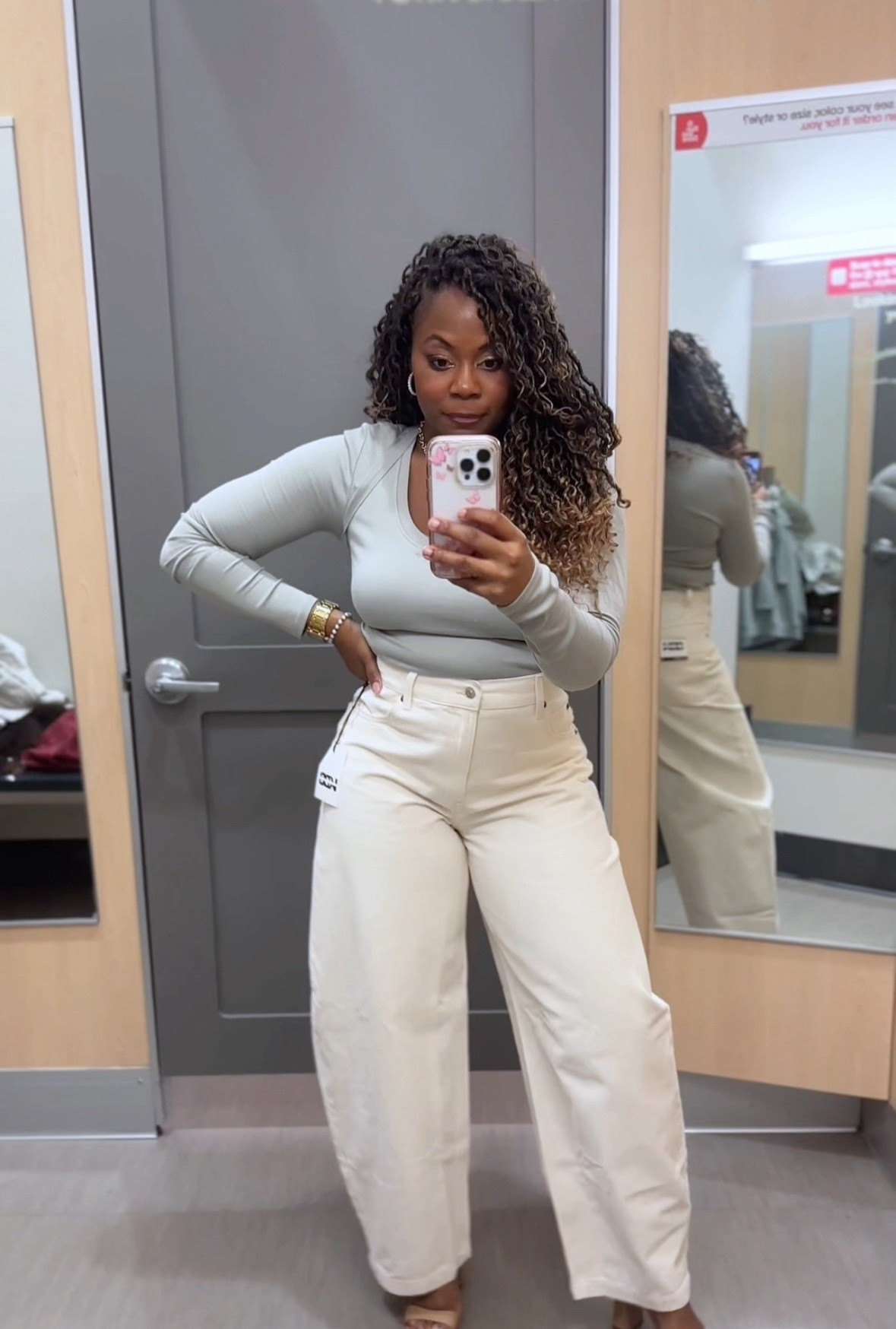 This outfit is so perfect for spring! I love the extra detail on the top and these cream colored pants are very on trend for spring 2026!

￼ I’m wearing my true size a small top and a size 6 jeans