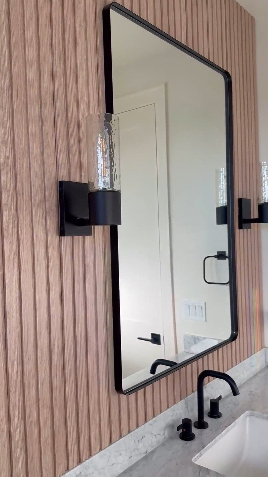 I chose these fluted wall panels for my son’s bathroom because I wanted something that felt elevated but still kid-friendly. I love how they add texture and interest without making the space feel busy or overdone.

They were easy to install and instantly changed the whole feel of the room. It’s one of those updates that looks custom but works well for everyday life. Everything is linked here if you’re planning a similar refresh. 

 

#LTKSaleAlert #LTKU #LTKHome