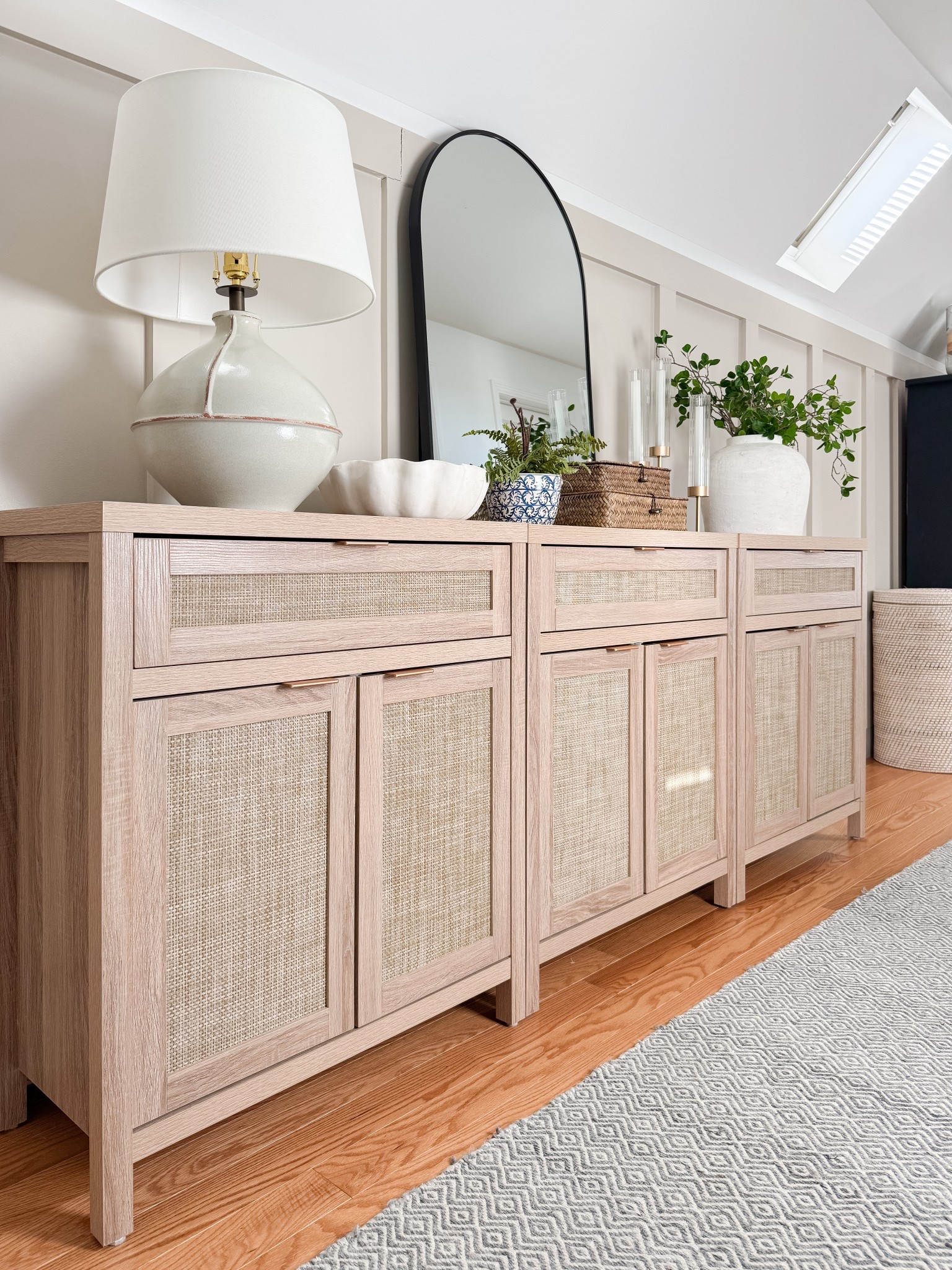 This woven sideboard adds storage and texture while elevating the entire space. coastal storage furniture, sideboard buffet, woven furniture, neutral home decor, coastal interiors, timeless furniture, home organization, living room styling, sherricalnanhome

#LTKHome