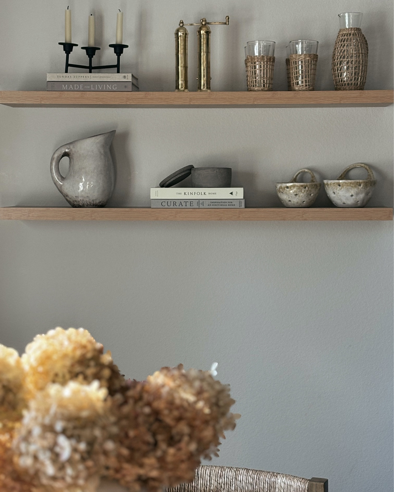 Dining / kitchen shelf styling 🤍
Layering everyday pieces with intention keeps open shelving feeling warm and curated—not cluttered. Mixing ceramics, stacked books, glassware, and natural tones creates a timeless, elevated look while still keeping everything functional for daily use.

Dining shelf styling, kitchen shelf styling, open shelving decor, neutral kitchen decor, timeless dining room design, floating shelves, layered home styling, warm neutral interiors, functional kitchen decor

#LTKHome