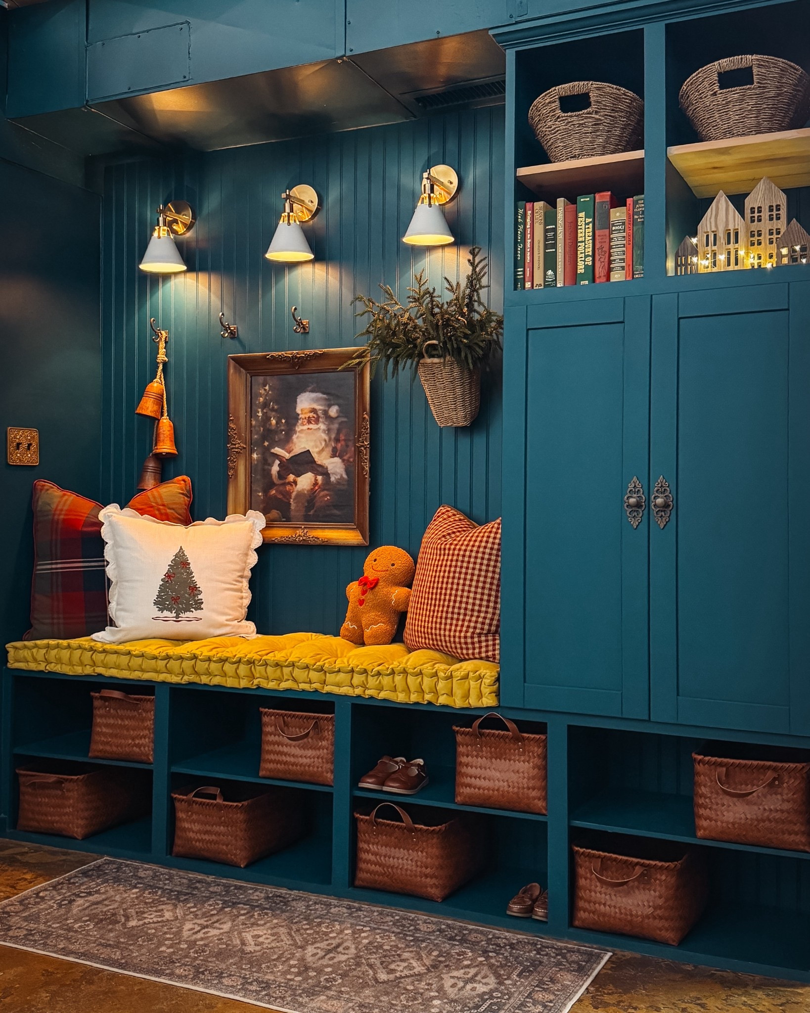 Our moody mudroom is the heartbeat of our home—our family drop-zone, storage hub, and everyday home base. It’s where we grab our shoes on the way out and hang up our coats after a long day. Since it’s one of our most-used spaces, I wanted it to feel warm, welcoming, and lived-in. Warm tones, cozy patterns, basket storage, and a touch of “fresh” greenery give this little corner a festive, functional vibe. What do you think? ❤️

#LTKHoliday #LTKHome #LTKSeasonal