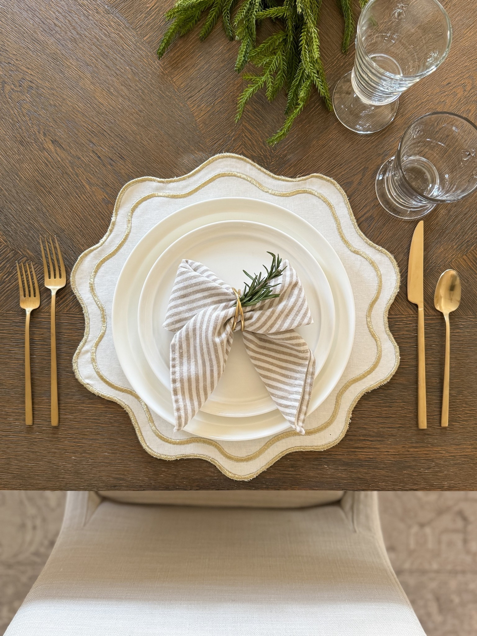 Simple holiday place setting with affordable placemats from target, napkins from Amazon and classic white plates from Wayfair.

#LTKSeasonal #LTKHome #LTKHoliday