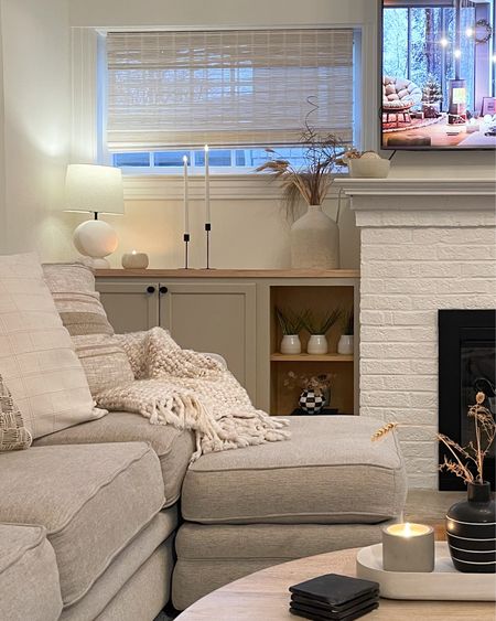 Cozy living room home decor neutral modern organic clean grey sectional built ins fireplace lamp candles shelf styling interior design 

#LTKSeasonal #LTKfindsunder50 #LTKhome