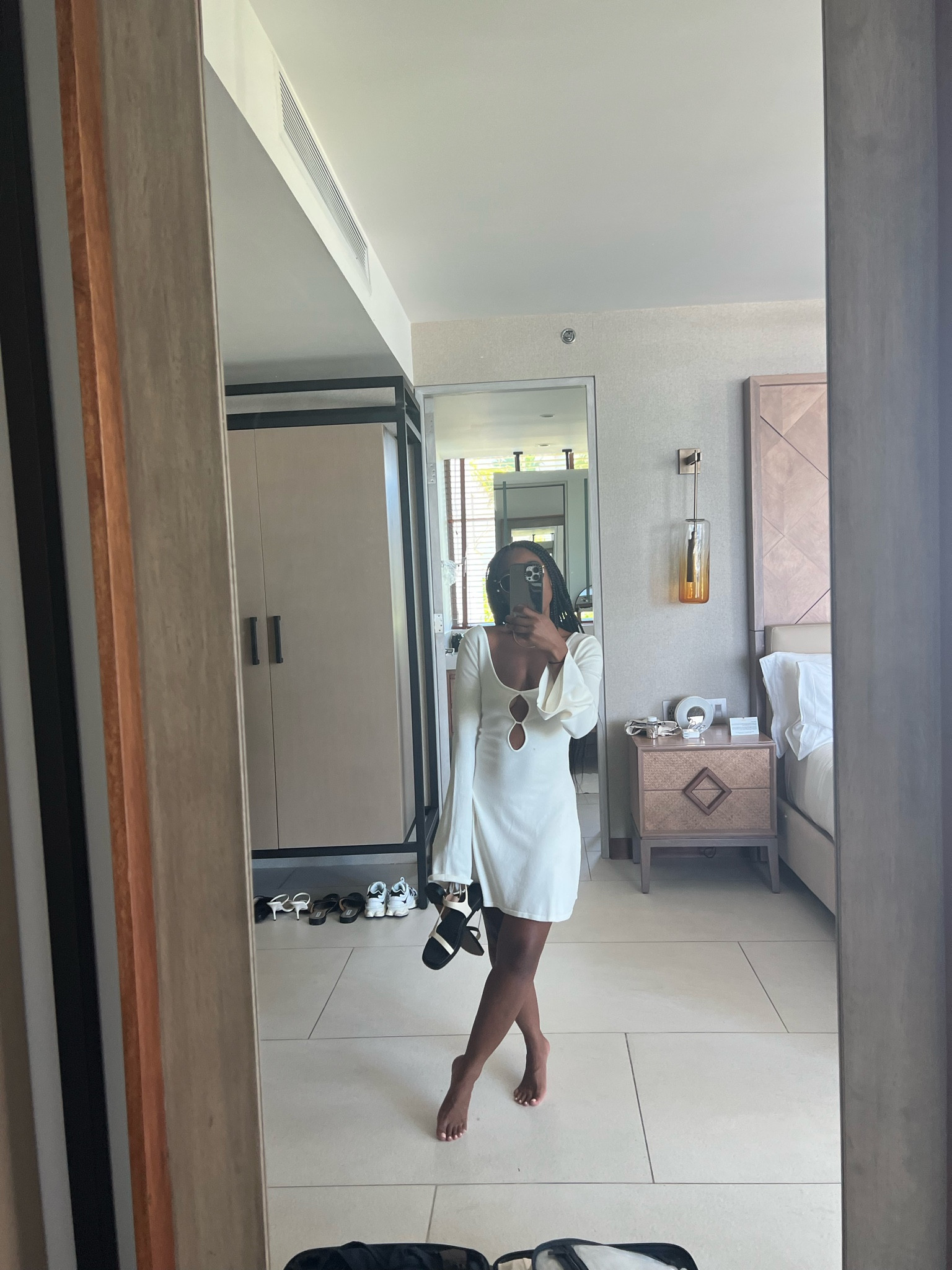 Cream  cutout mini dress and cream strappy sandals 

#LTKstyletip #LTKFind #LTKshoecrush