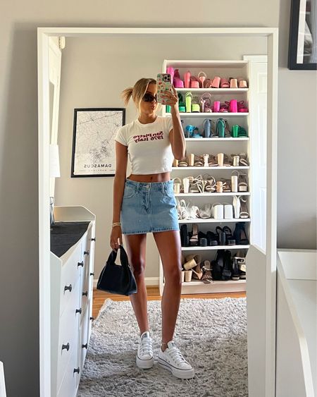 Easy spring outfit idea. Love this casual baby tee and denim skirt combo for a European summer too. 

Use code HCOMCKENZIE for an extra 25% off your Hollister purchase 💗